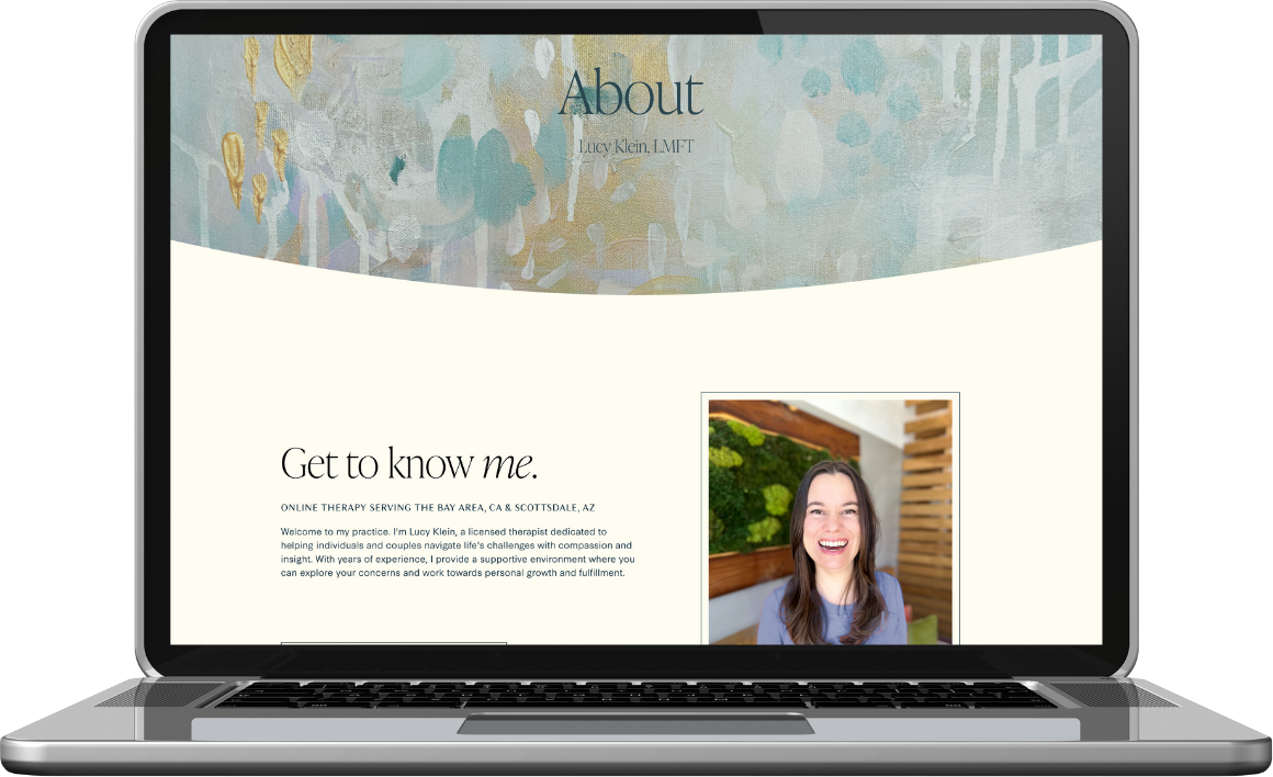 Laptop displaying an About page for Lucy Klein, LMFT, with a photo of a smiling woman in a blue top and an artistic background behind the text.