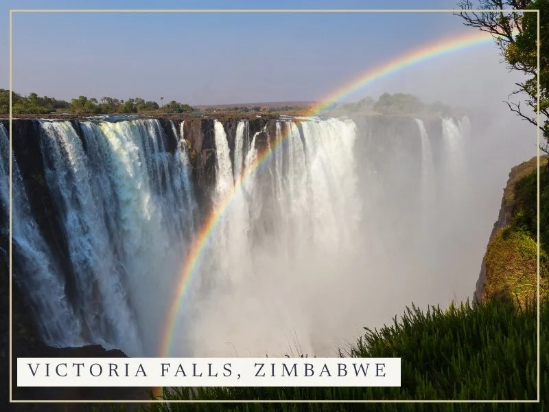 Victoria Falls with a rainbow in the spray