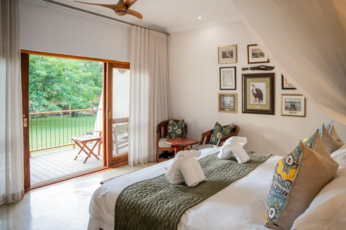 A Safari Room at Chobe Safari Lodge, with doors onto the porch
