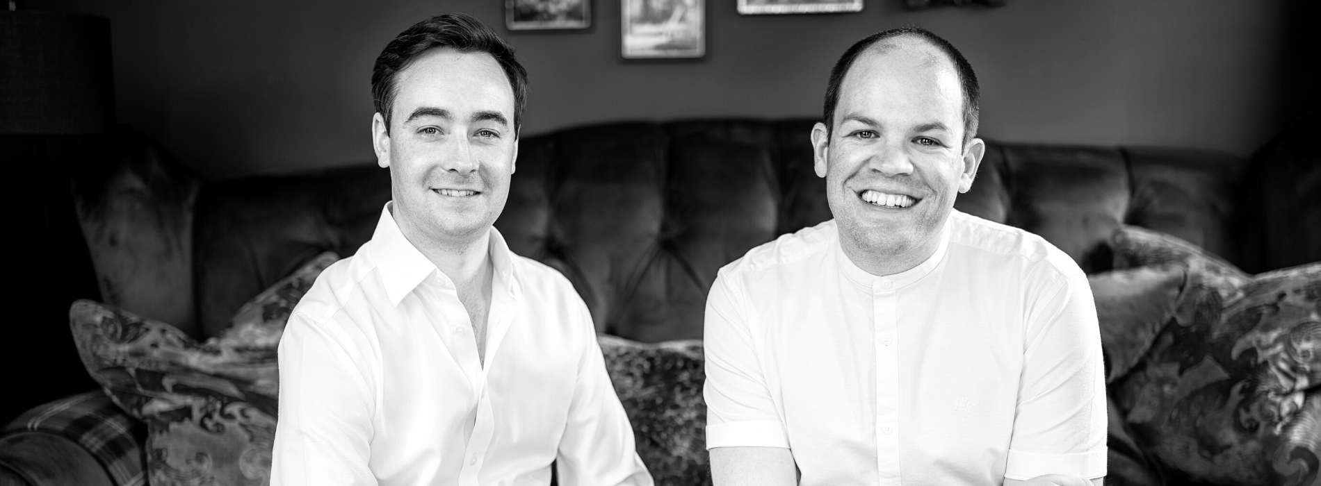 Black and white portrait of Hugh and Ben, the founders of Huben Travel