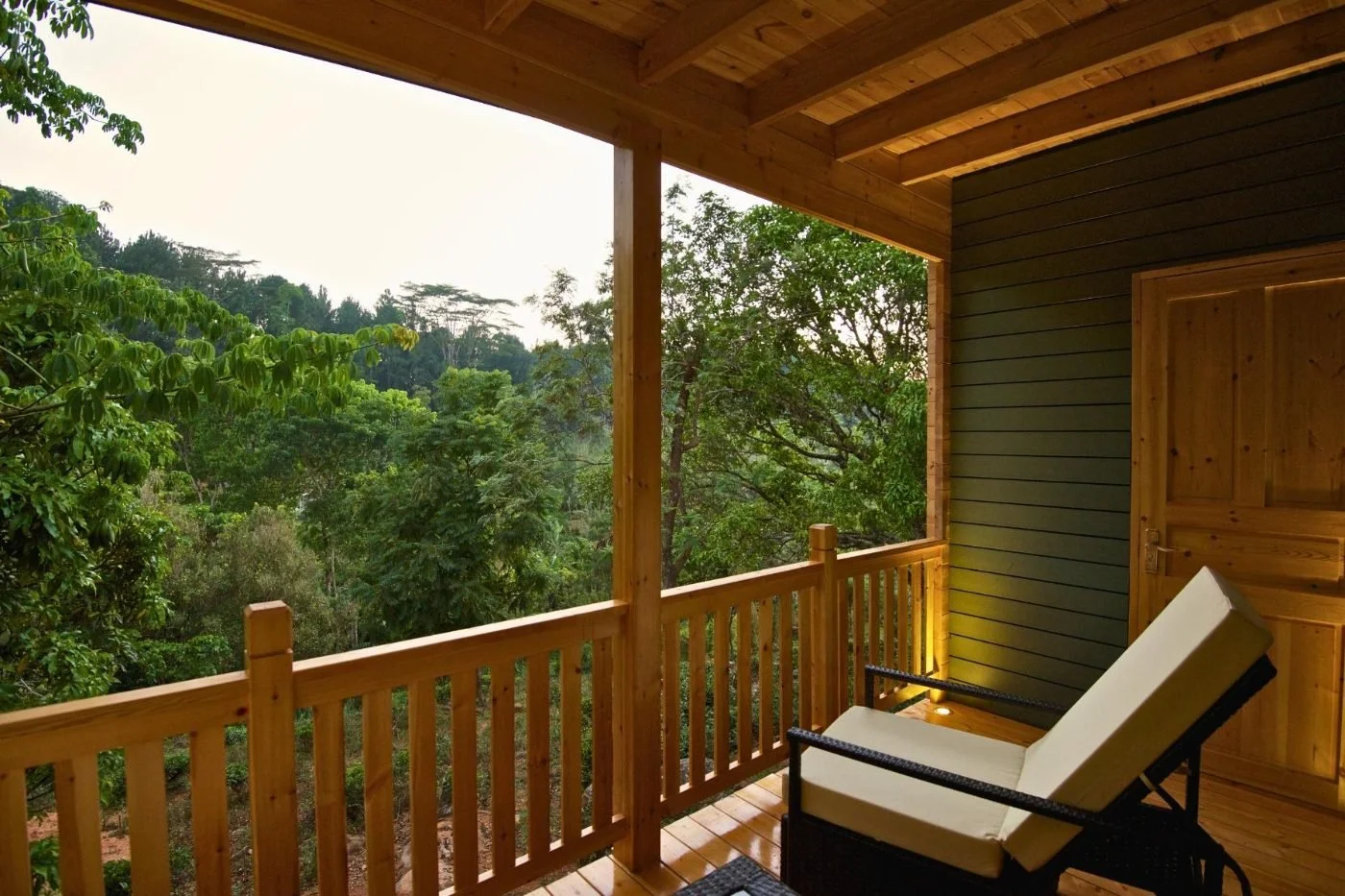 The balcony of a Garden Chalet looking out over the forest