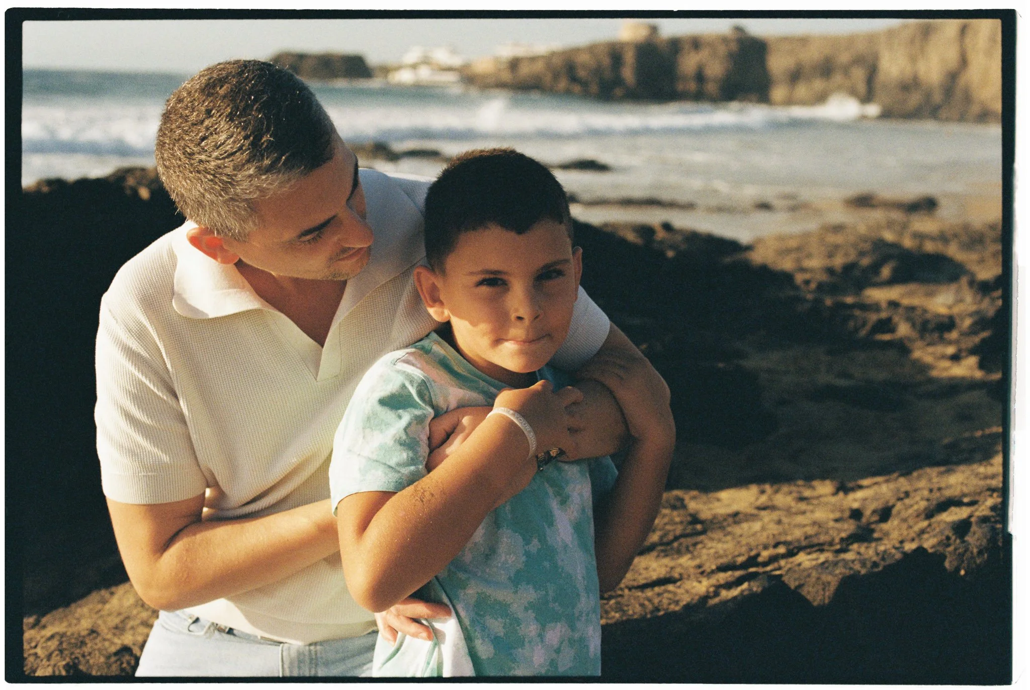 Family interaction during a photography session in Tenerife