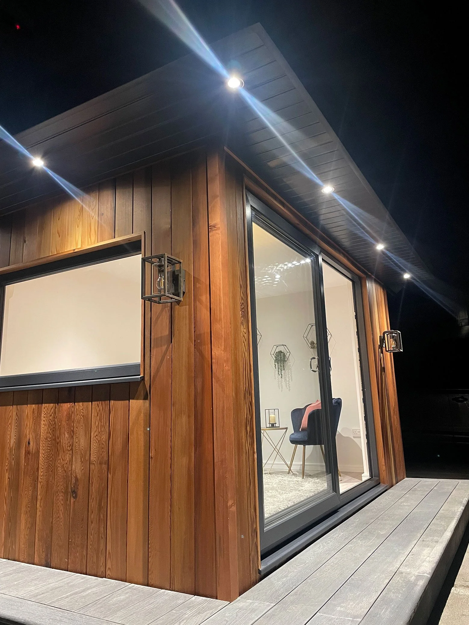  Rustic cabin with glowing lights. 