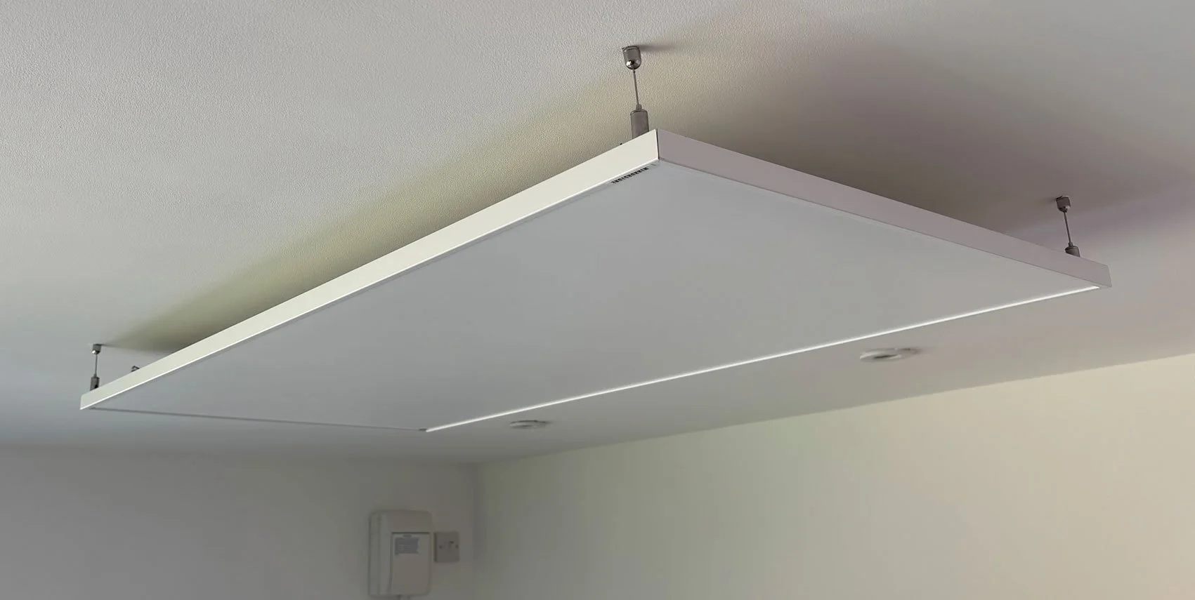 overhead-electric-panel-heater-garden-studio.jpg
