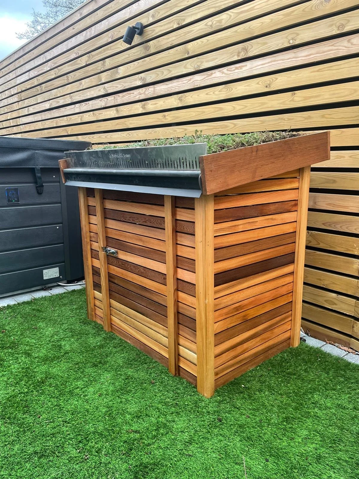 bespoke-timber-storage-and-planter-unit-cardiff-modern-garden-design.jpeg
