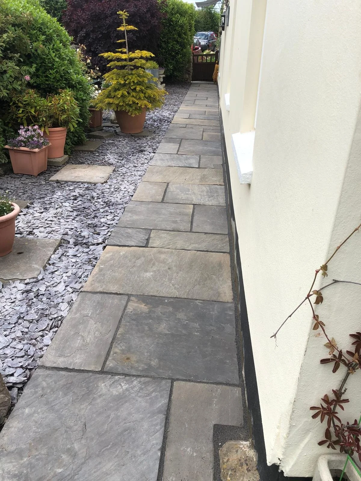 modern-grey-indian-sandstone-patio-penarth-garden-design.jpeg