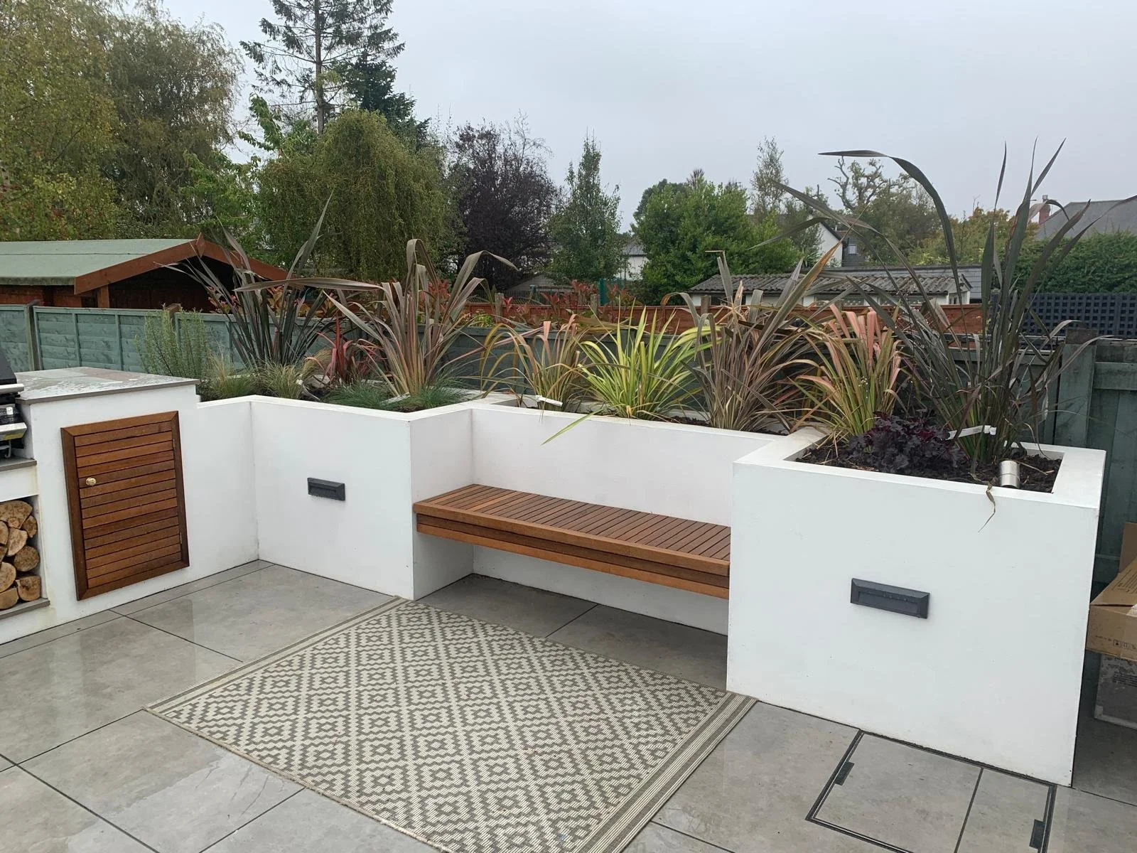 premium-outdoor-kitchen-with-bench-seating-bridgend-garden.jpeg