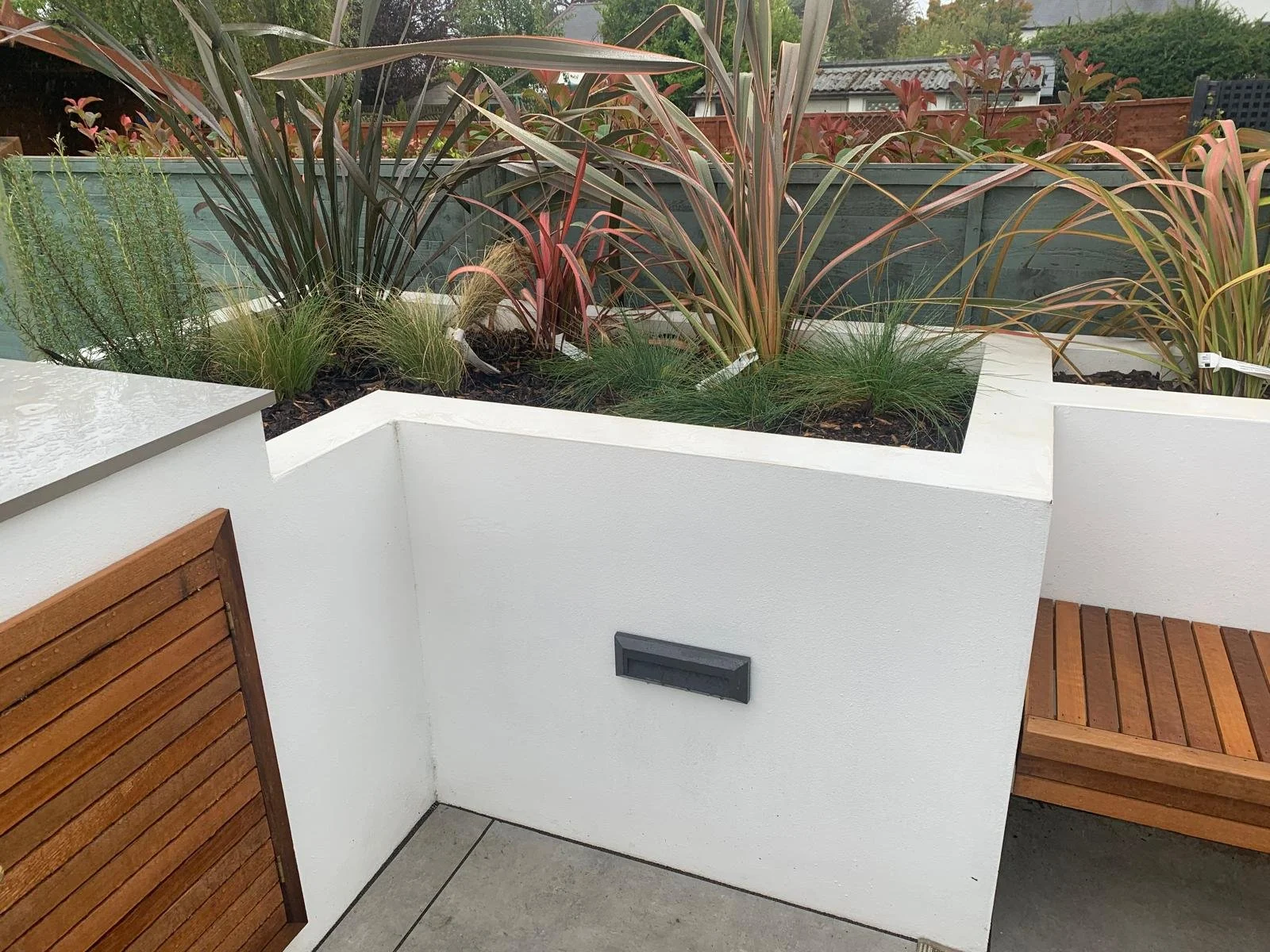 minimalist-garden-with-bench-seating-bridgend-modern-patio.jpeg