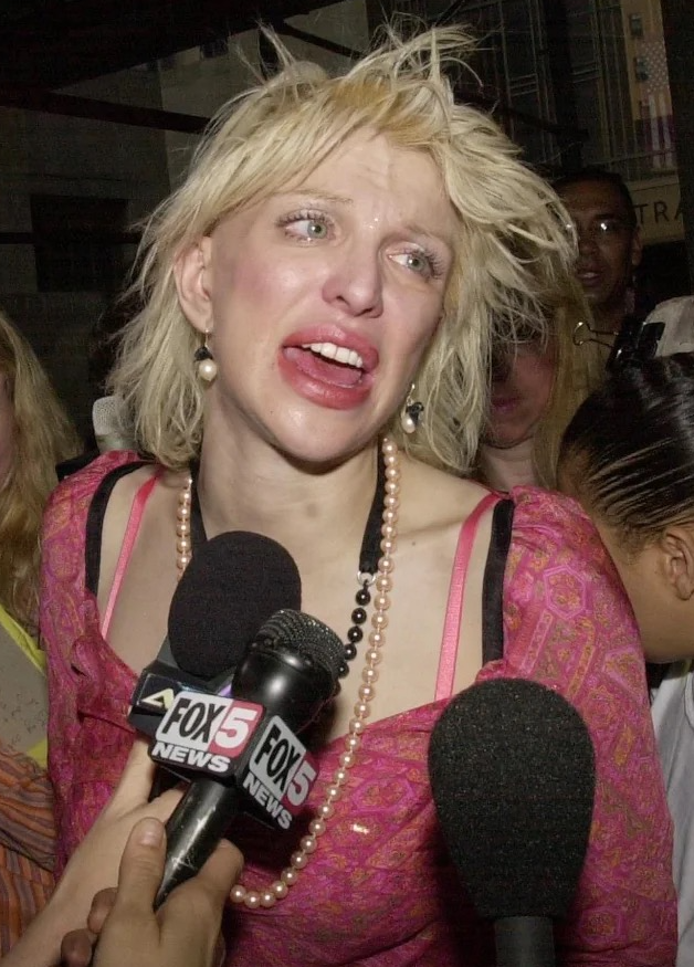 Courtney Love charged with attacking woman