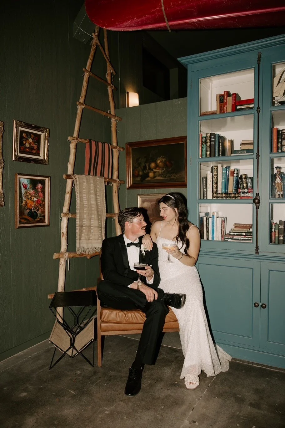 Timeless elegance in Downtown Chico: The green walls in The Westport’s library offer a breathtaking moment for the bride and groom