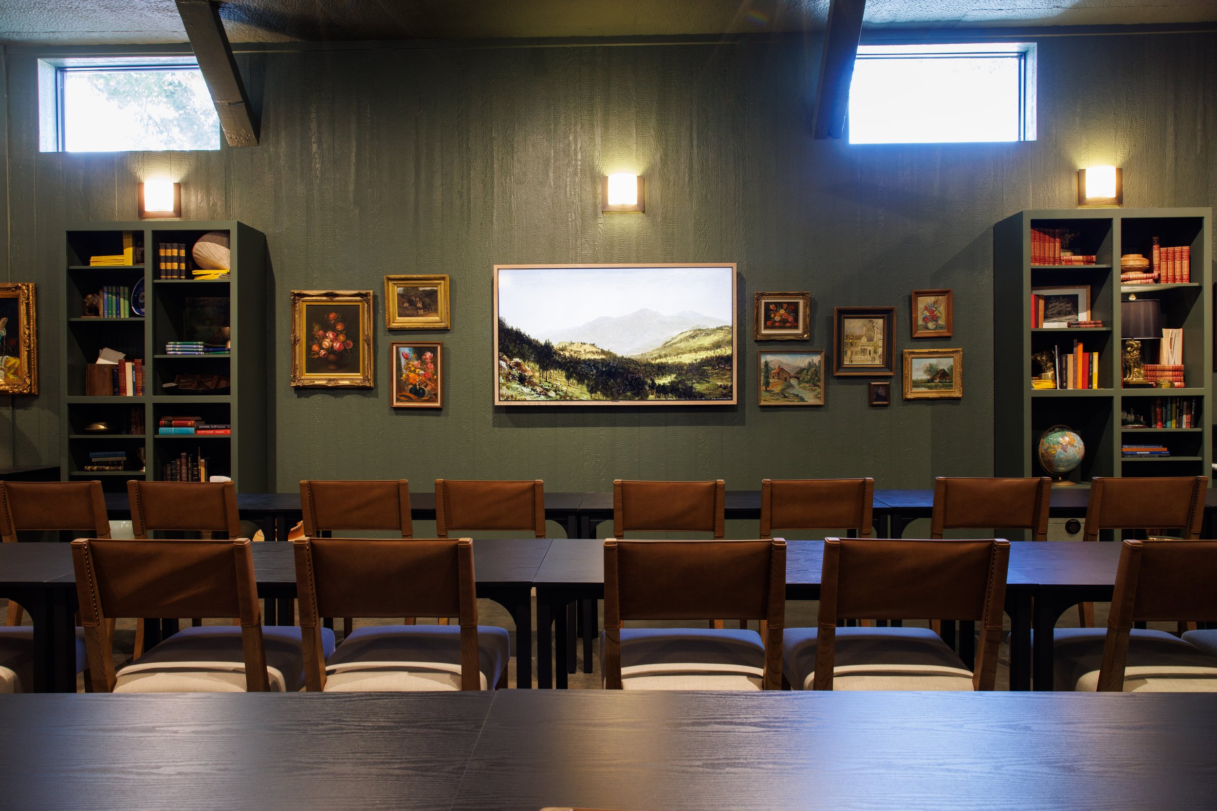 Host your next professional session in The Library at The Westport. This 730-square-foot training venue in Downtown Chico comfortably accommodates up to 34 guests with flexible desk and chair configurations. Surrounded by curated gallery art, it is t