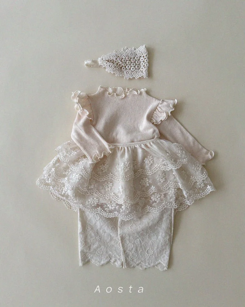 tiered skirt trousers and top cream.jpg