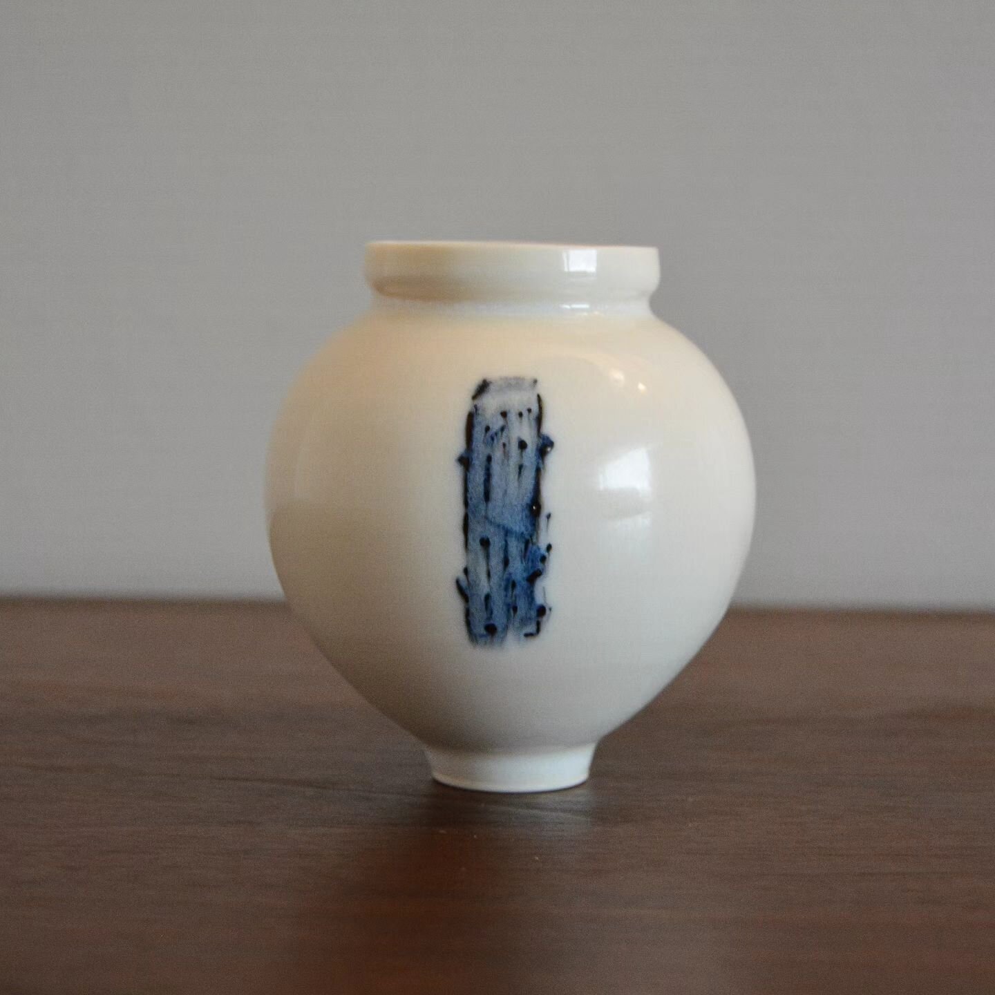 Here's another unique piece. A small wheel thrown porcelain moon jar. Measuring just 10cms tall with a simple cobalt detail on the front and back. I really like how this one turned out. 

Only one of these will be available to purchase from the websi