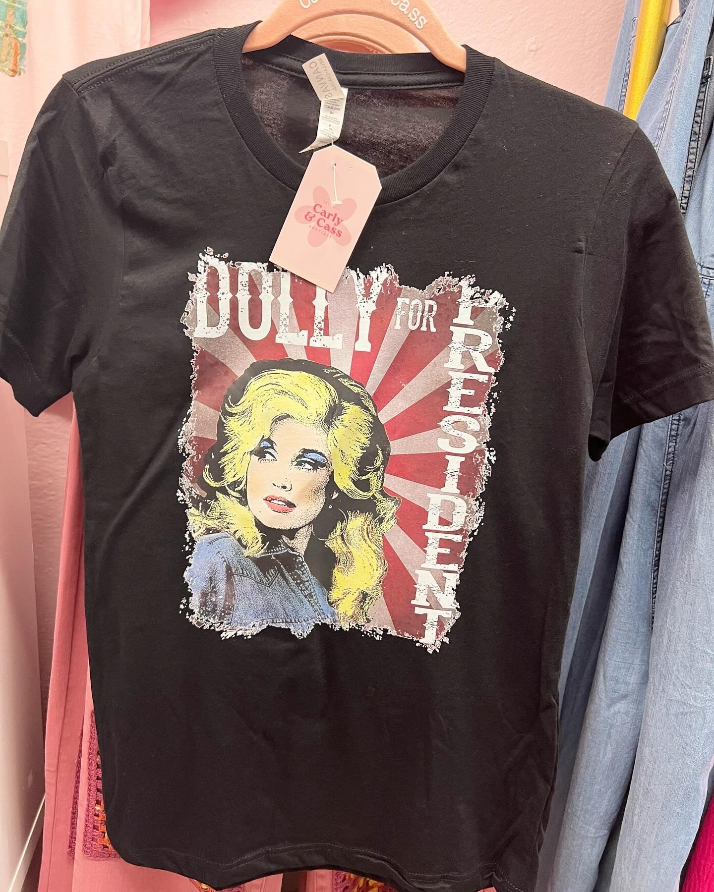 We&rsquo;d vote for her! 😍 New and restocked Dolly tees now available in our Sylva Store! #dolly 💕