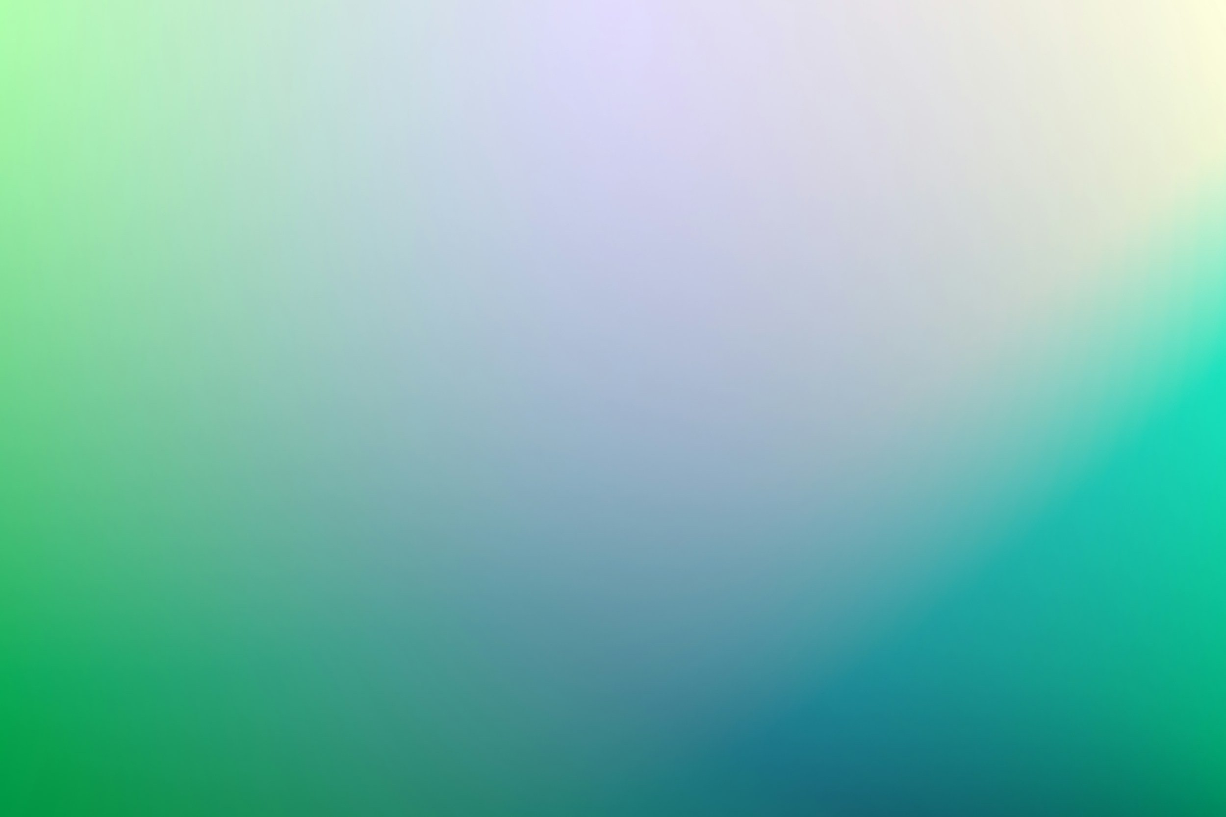 Blurred pastel background with shades of green, blue, yellow, and purple.