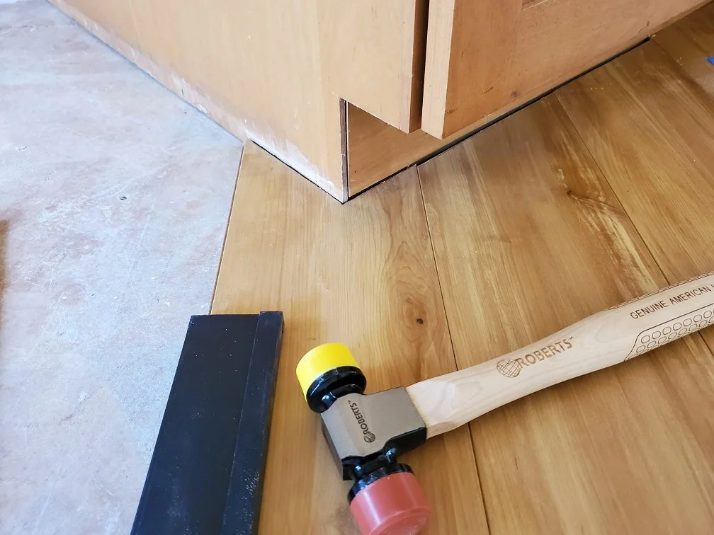 laminate flooring installation cut around cabinets