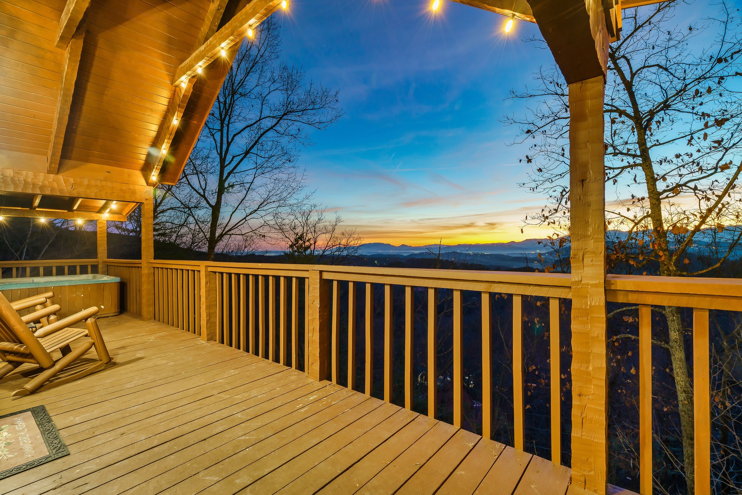 Just one step out your door offers a panoramic smoky mountain view, an expansive and breathtaking natural spectacle that envelops you in its vast, serene beauty instantly.