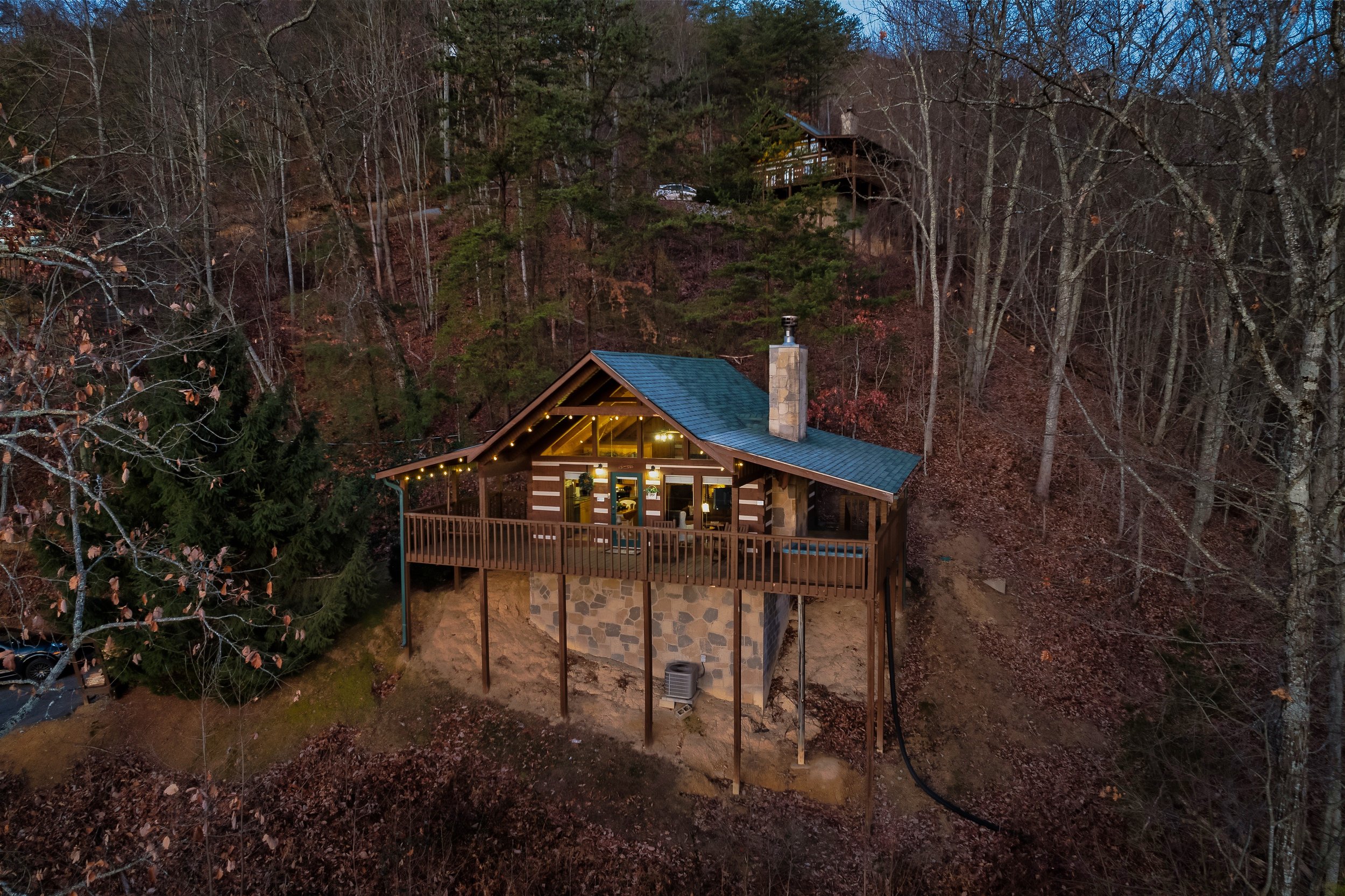 From your own deck, you absorb the surrounding nature, the sights and sounds of the outdoors enveloping you in a tranquil embrace, connecting you to the earth's serene rhythm