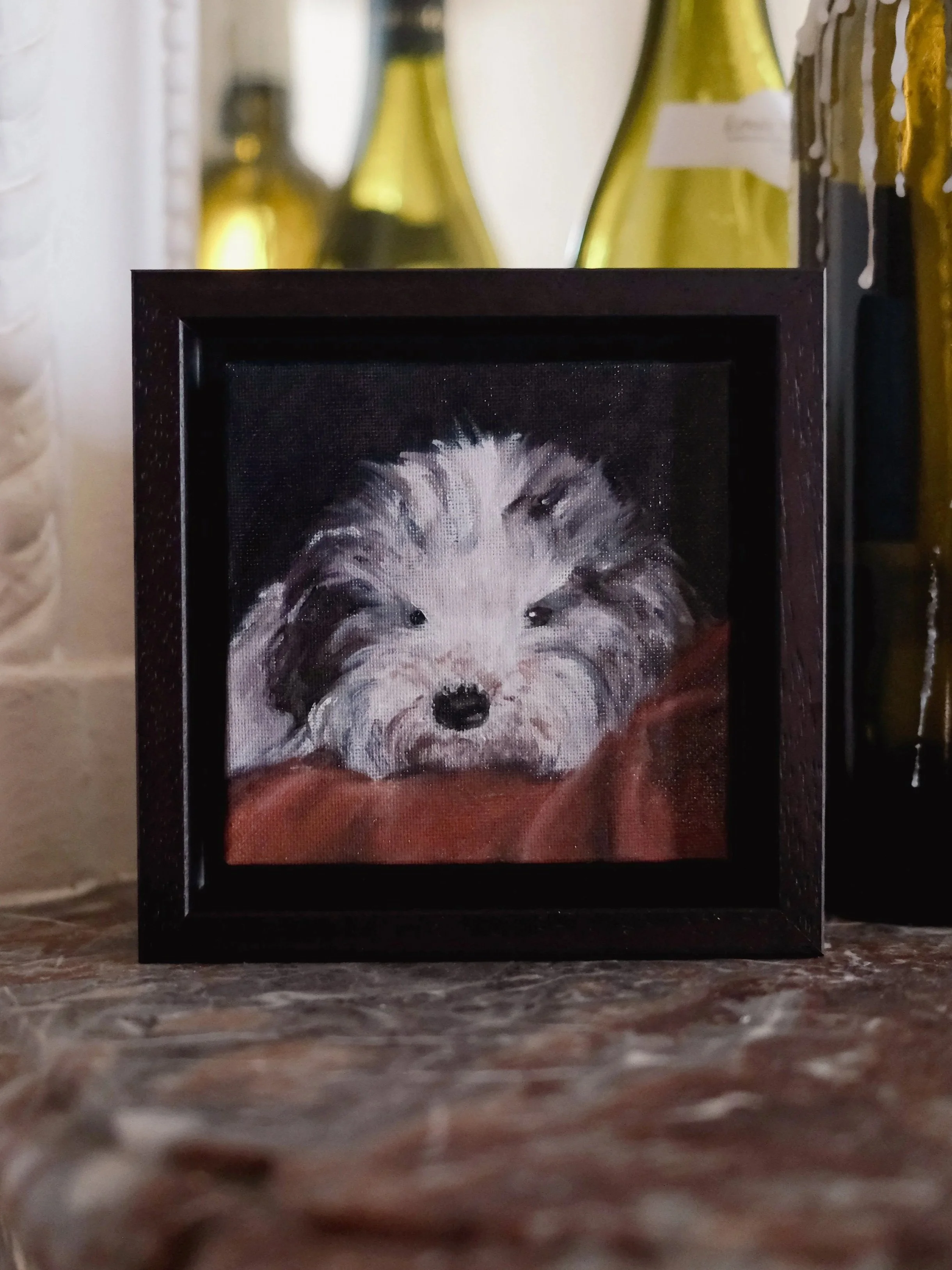 Framed oil painting of a pet dog