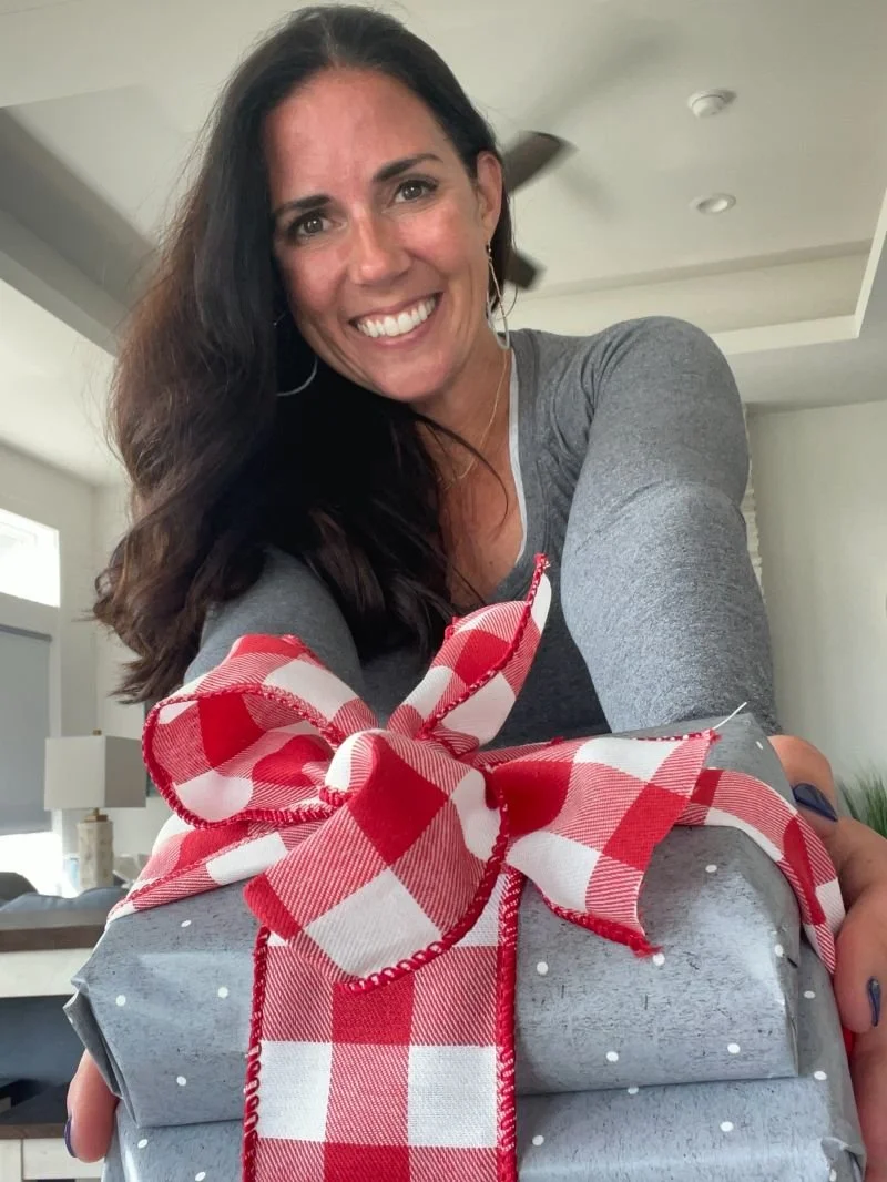 Kelly presenting a gift