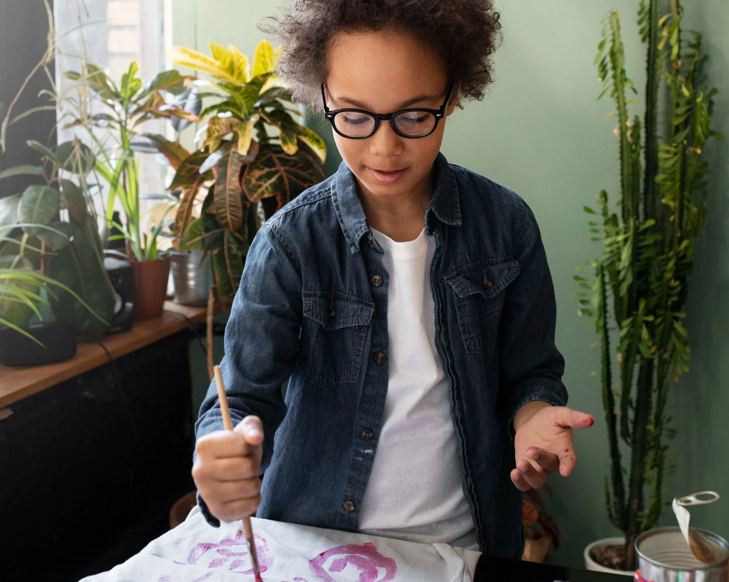 young-child-making-diy-project-from-upcycled-materials.jpg