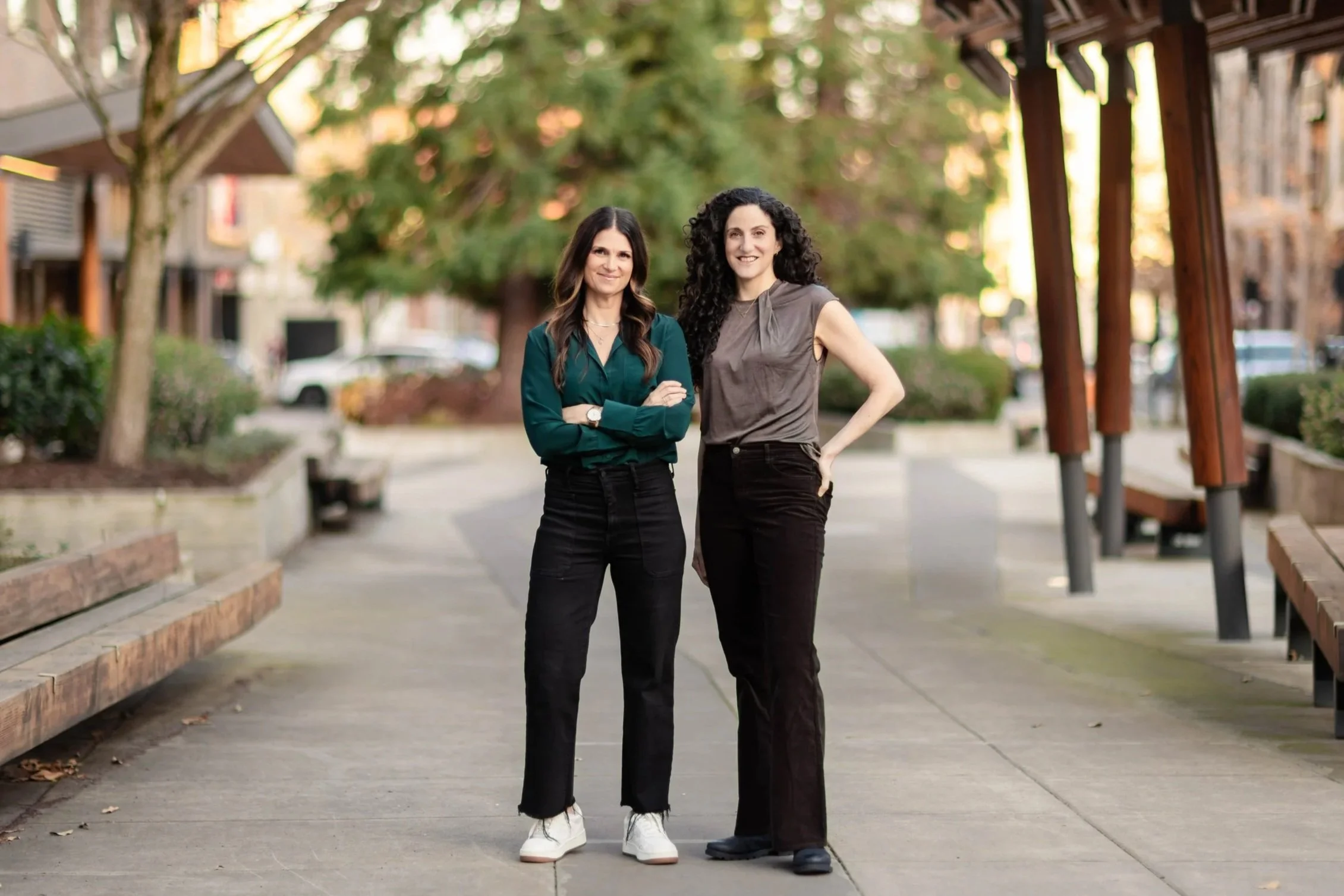 Two women standing outdoors