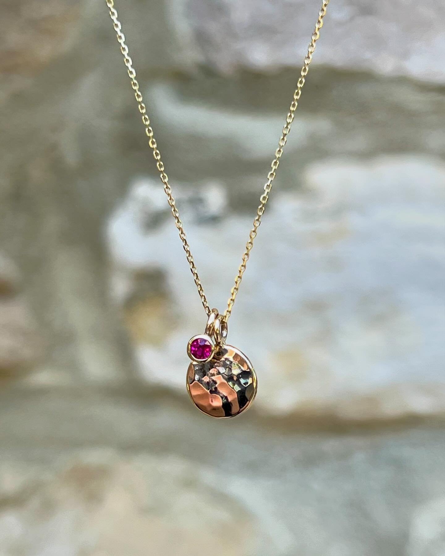 A hammered gold and ruby charm necklace 💕✨