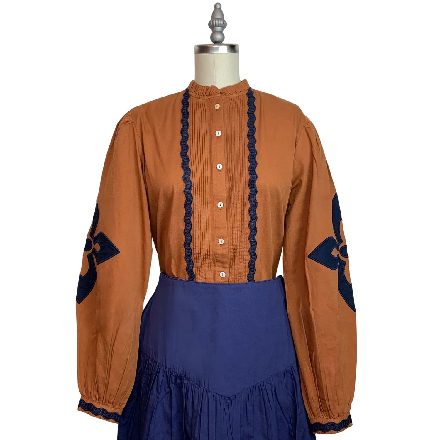 Sonmer Leonor Embroidered Blouson Sleeve Button Up Cotton Blouse Top In Caramel With Navy Ric Rac And Floral Appliqué Embroidery