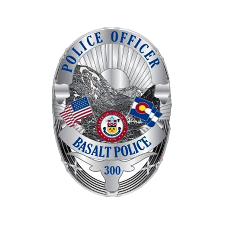 Police badge for Basalt Police Department featuring mountains, American and Colorado flags, and the department seal.