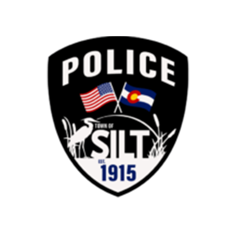 The Silt, Colorado police badge featuring American and Colorado flags, the year 1915, and a wildlife illustration.
