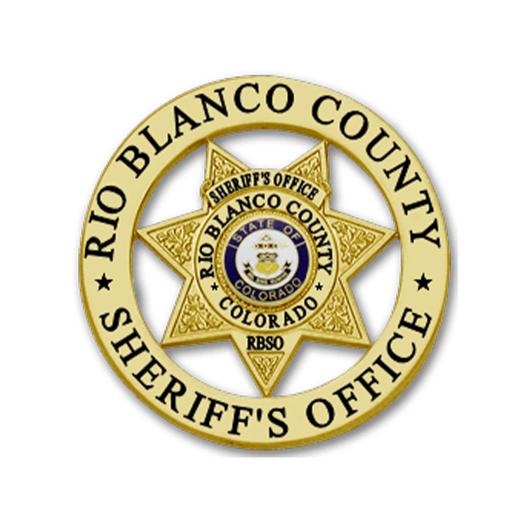 Official badge of the Rio Blanco County Sheriff's Office with a gold star and a circular emblem in the center.