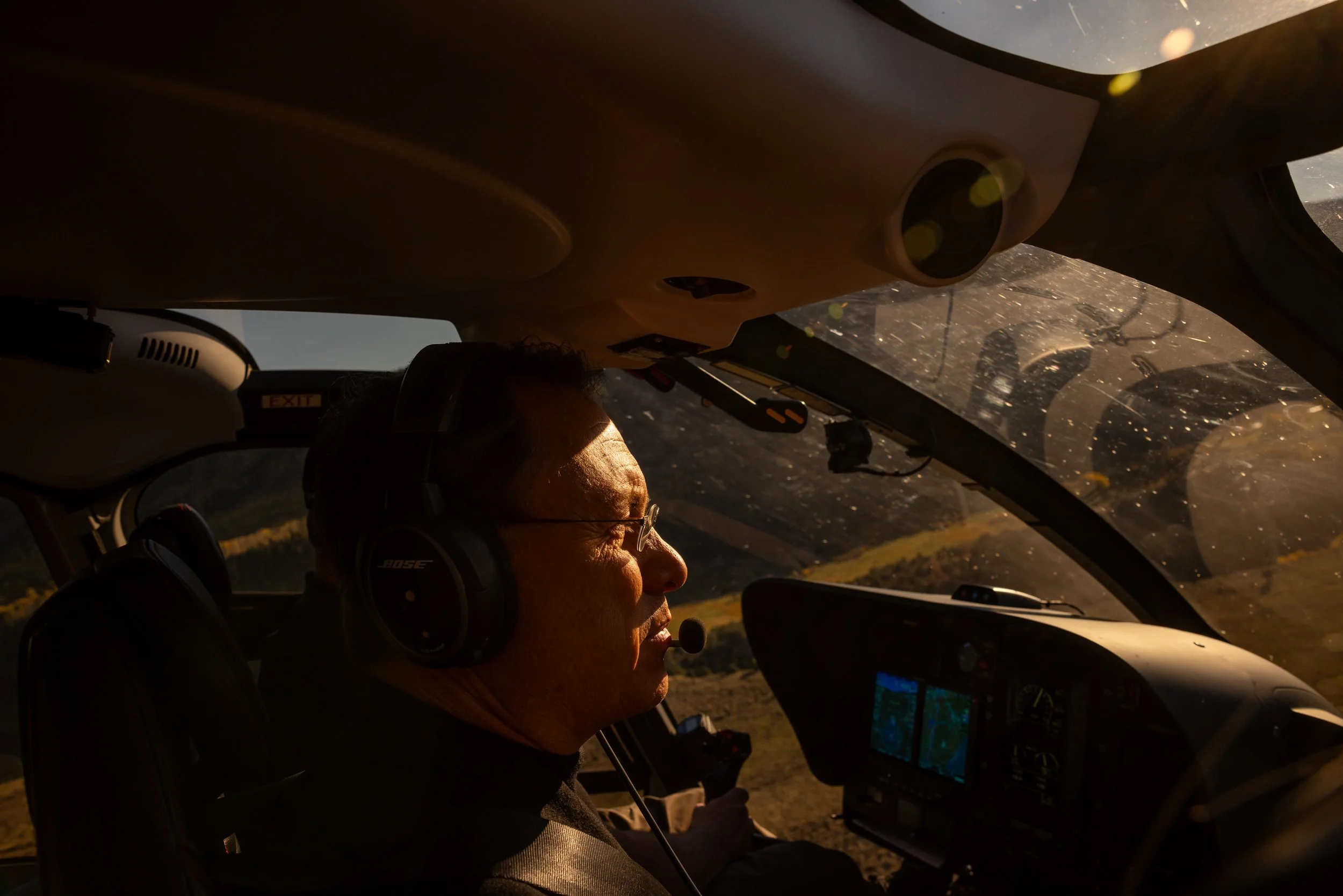 Brandon Fugal in his Airbus H130 helicopter piloted by his brother Cameron.