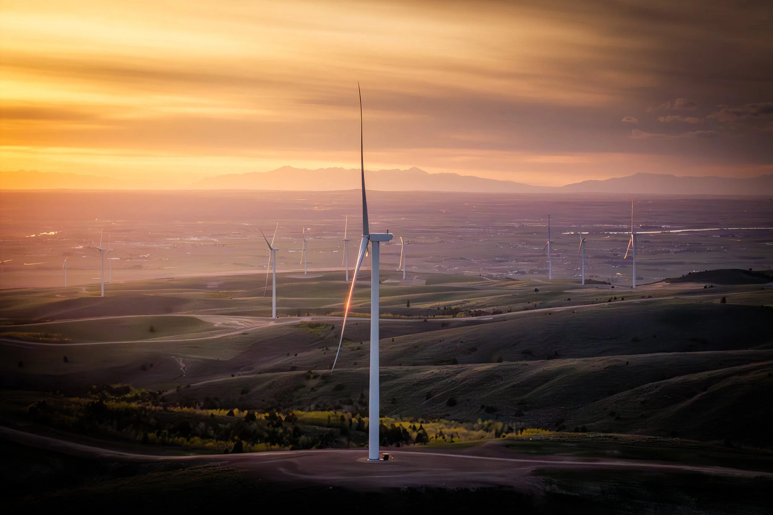 Wind turbines dot the landscape in eastern Idaho at a renewable energy facility.
