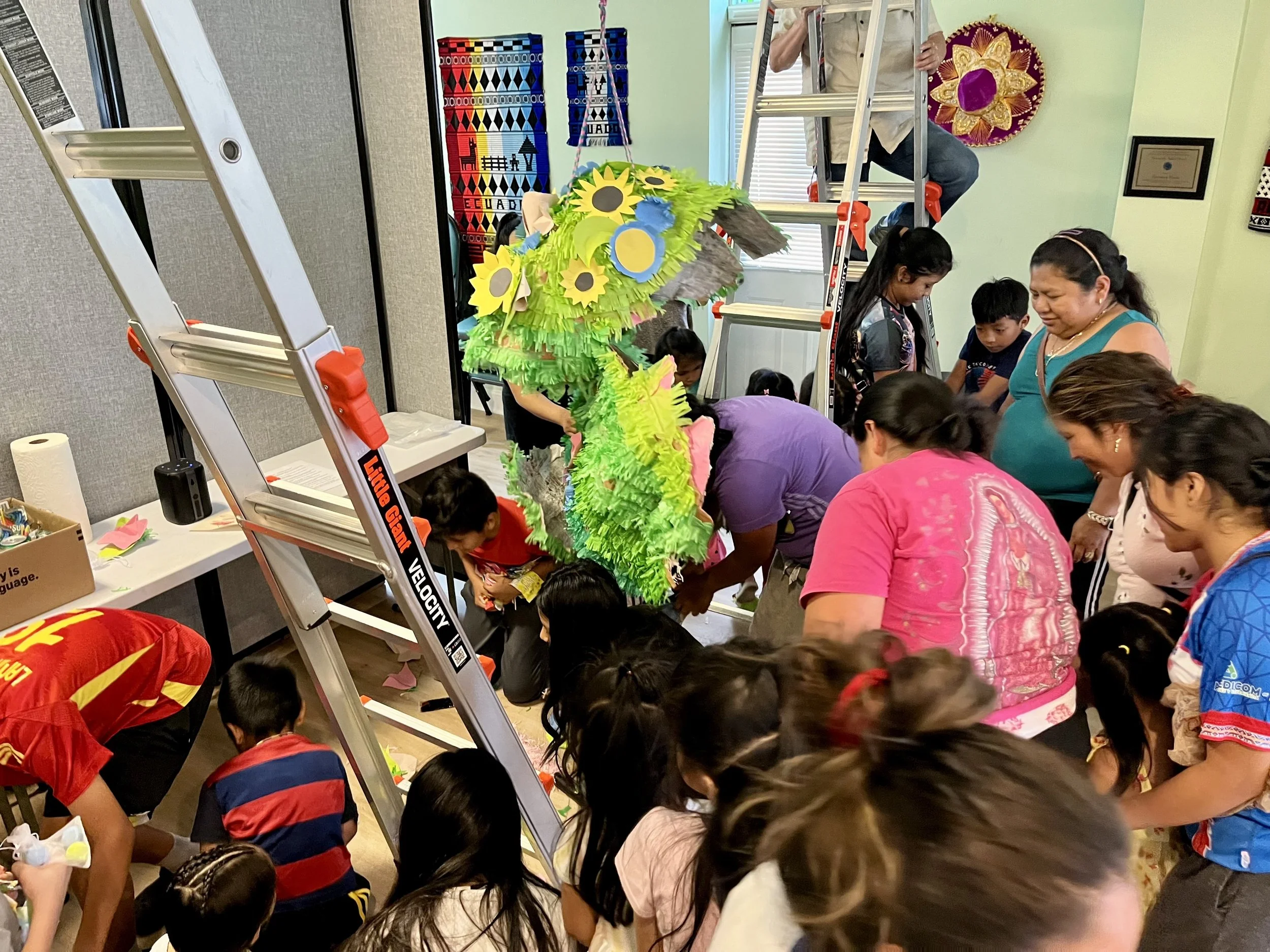 Semillas de Futuro (Esperanza Latino Center Breaking Ceremony), Papier-mâché (newspaper), tissue paper, cardboard, regenerative seed paper, and rope, 2025

--Semillas de Futuro is an eco-conscious piñata created by Batres Gilvin for a joyful communit
