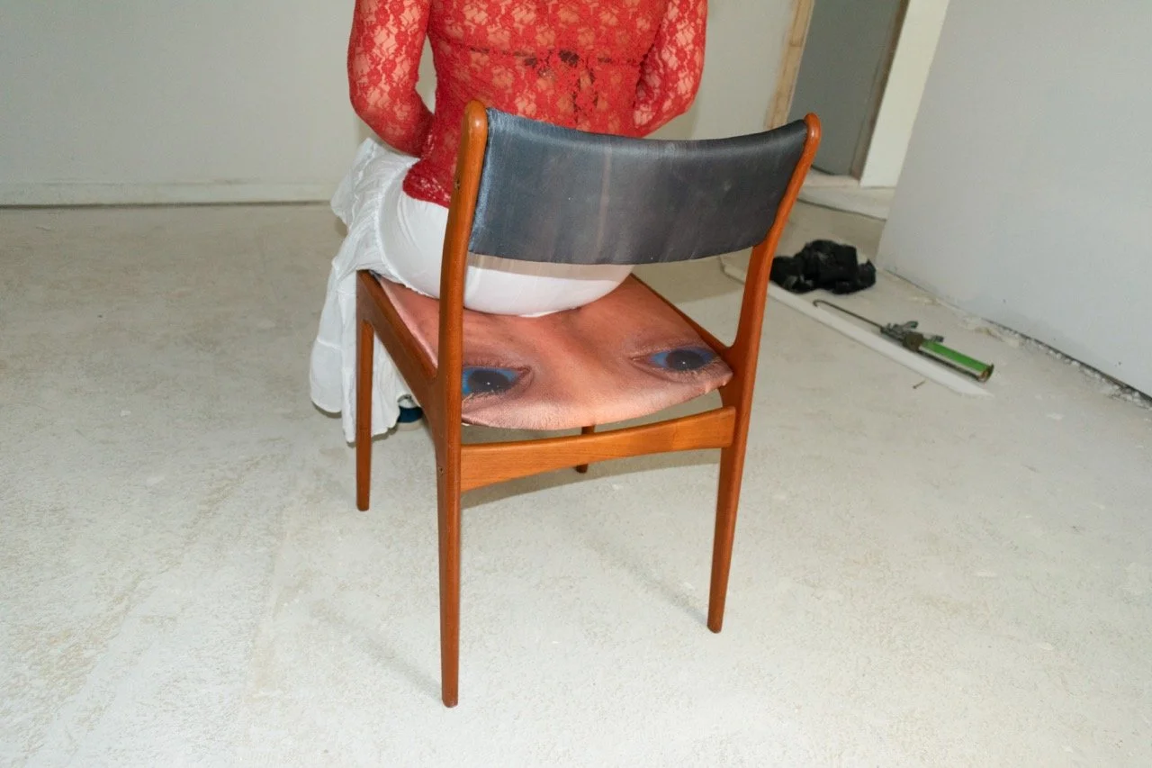 To be born in this form is humiliation, 33" x 18" x 19", photo sublimation dye on satin, chair