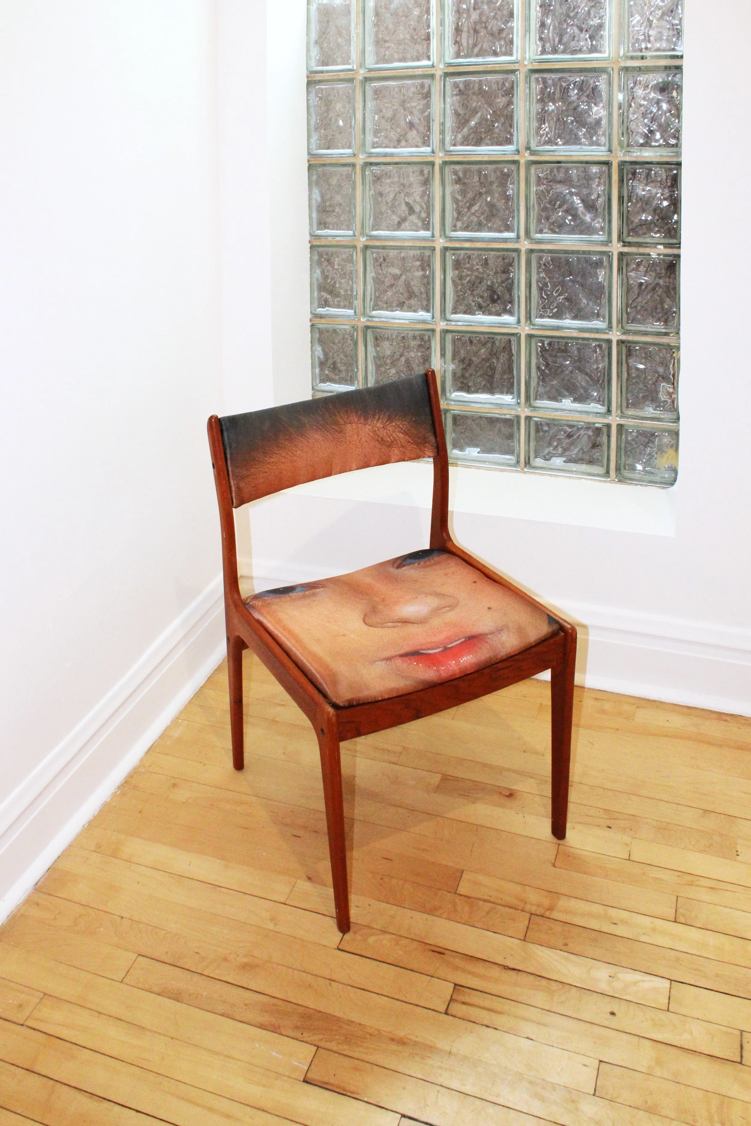 To be born in this form is humiliation, 33" x 18" x 19", photo sublimation dye on satin, chair