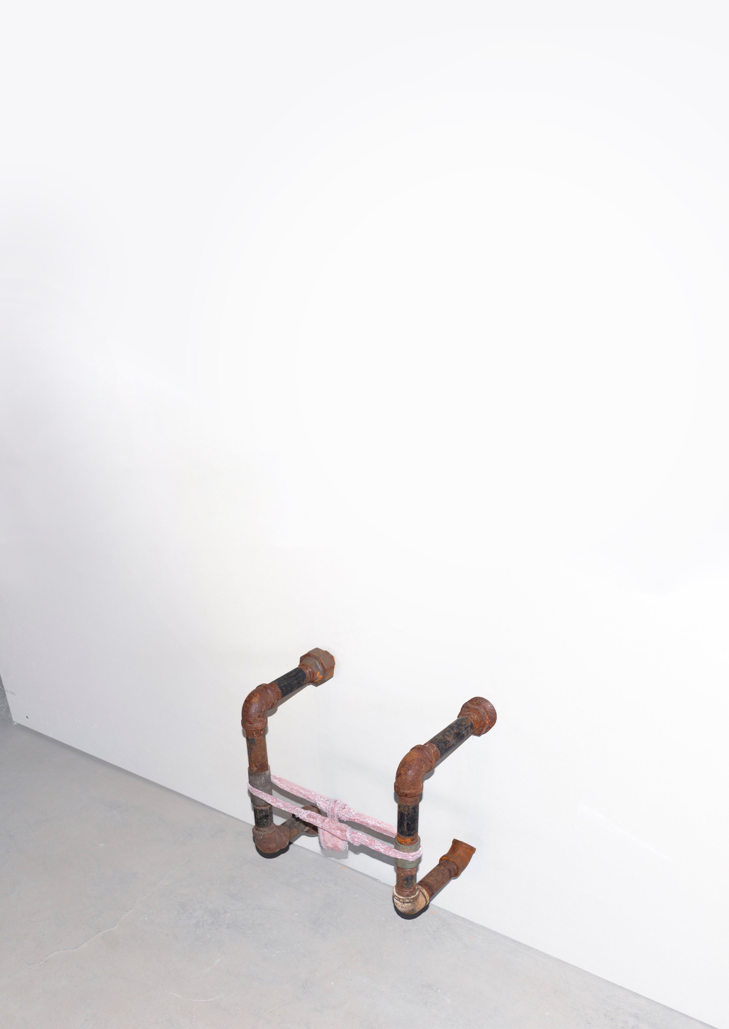 Urine Poem, 16.5" x 9" x 12", plumbing pipes, worn panties