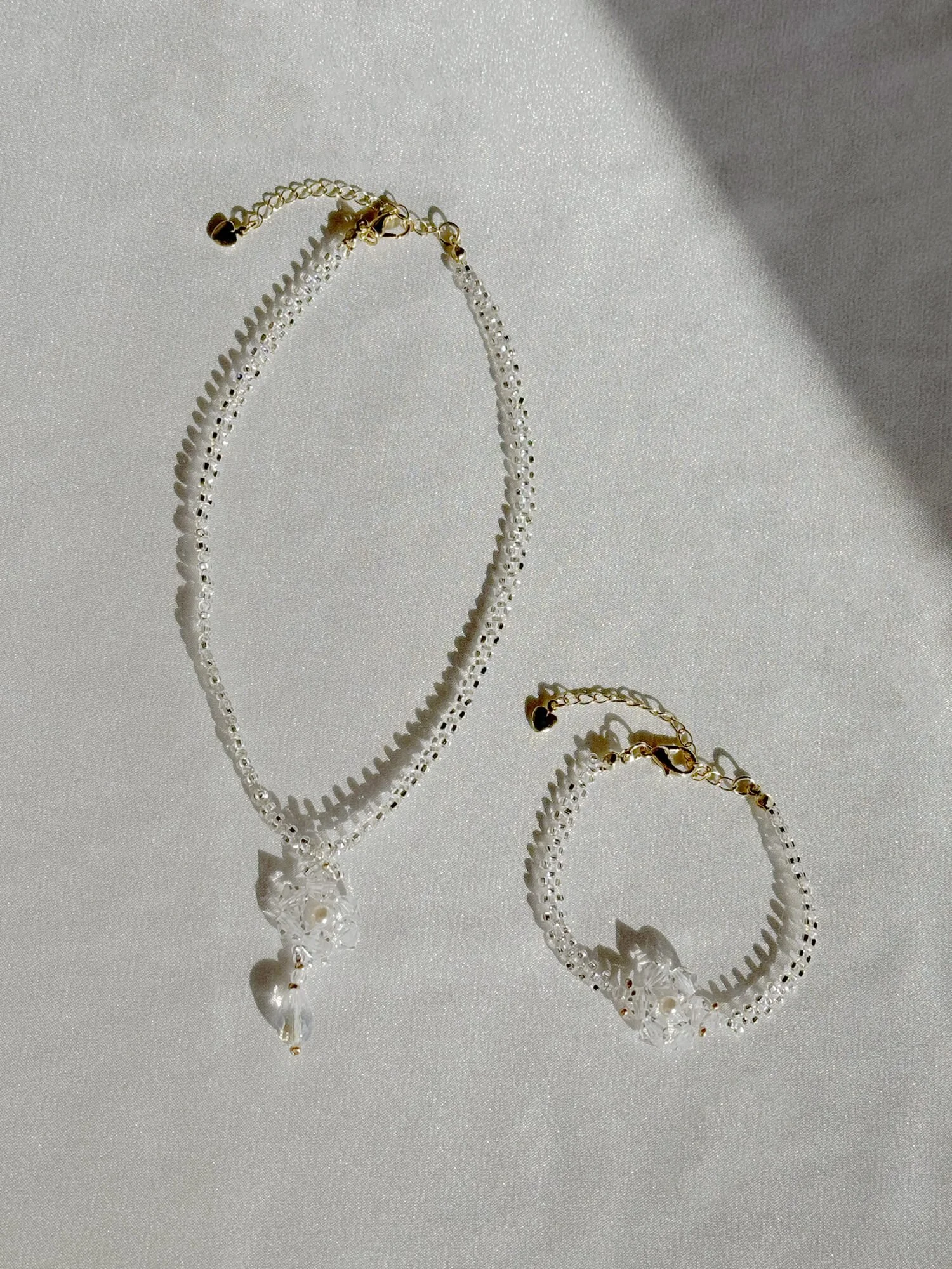 Sekka Winter Glow Duo — Snowflake Necklace & Bracelet Set