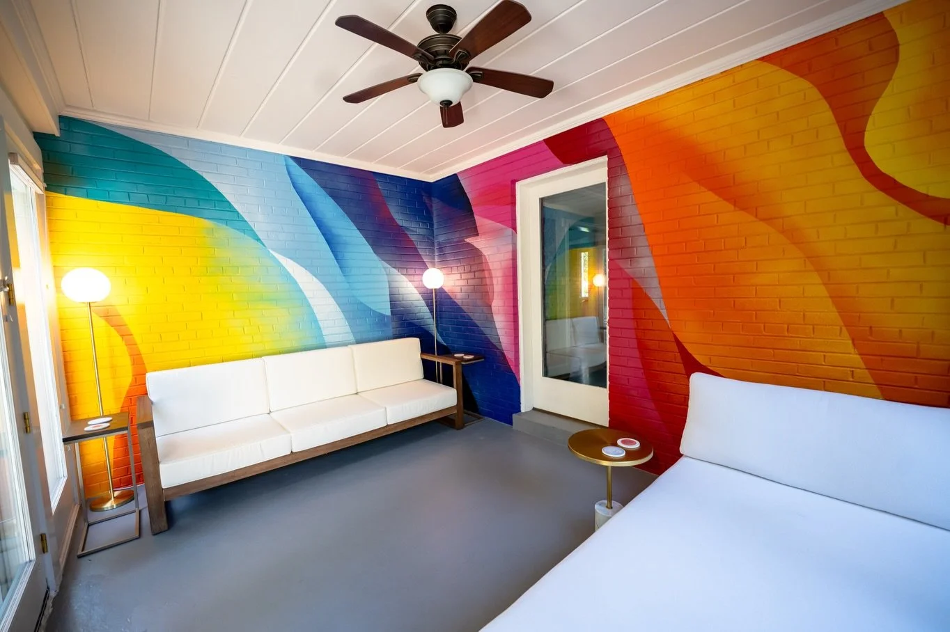 This is the kind of room color is made for.

Swipe for the before.

The mural pulls in bold color from around the home, then pushes it further so the space has a personality all its own. Now it feels bright, playful, and fully part of the house inste