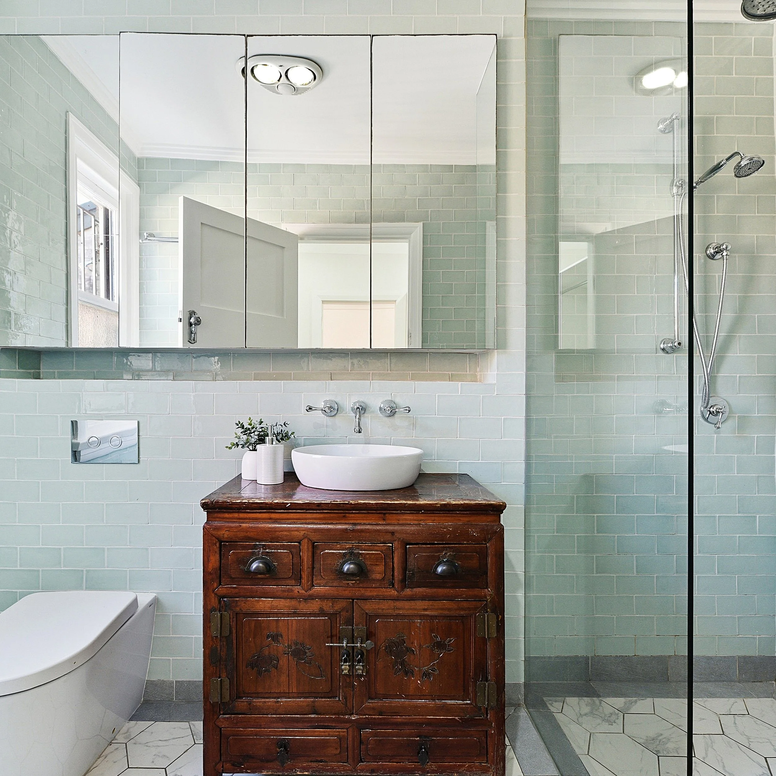 In a room of clean lines and white tiles, it&rsquo;s the vintage cabinet that steals the story. A piece that feels collected, not bought&mdash; like it came from another time, another place.

Captured by Talenty.

#talenty #talentyrealestate #realest