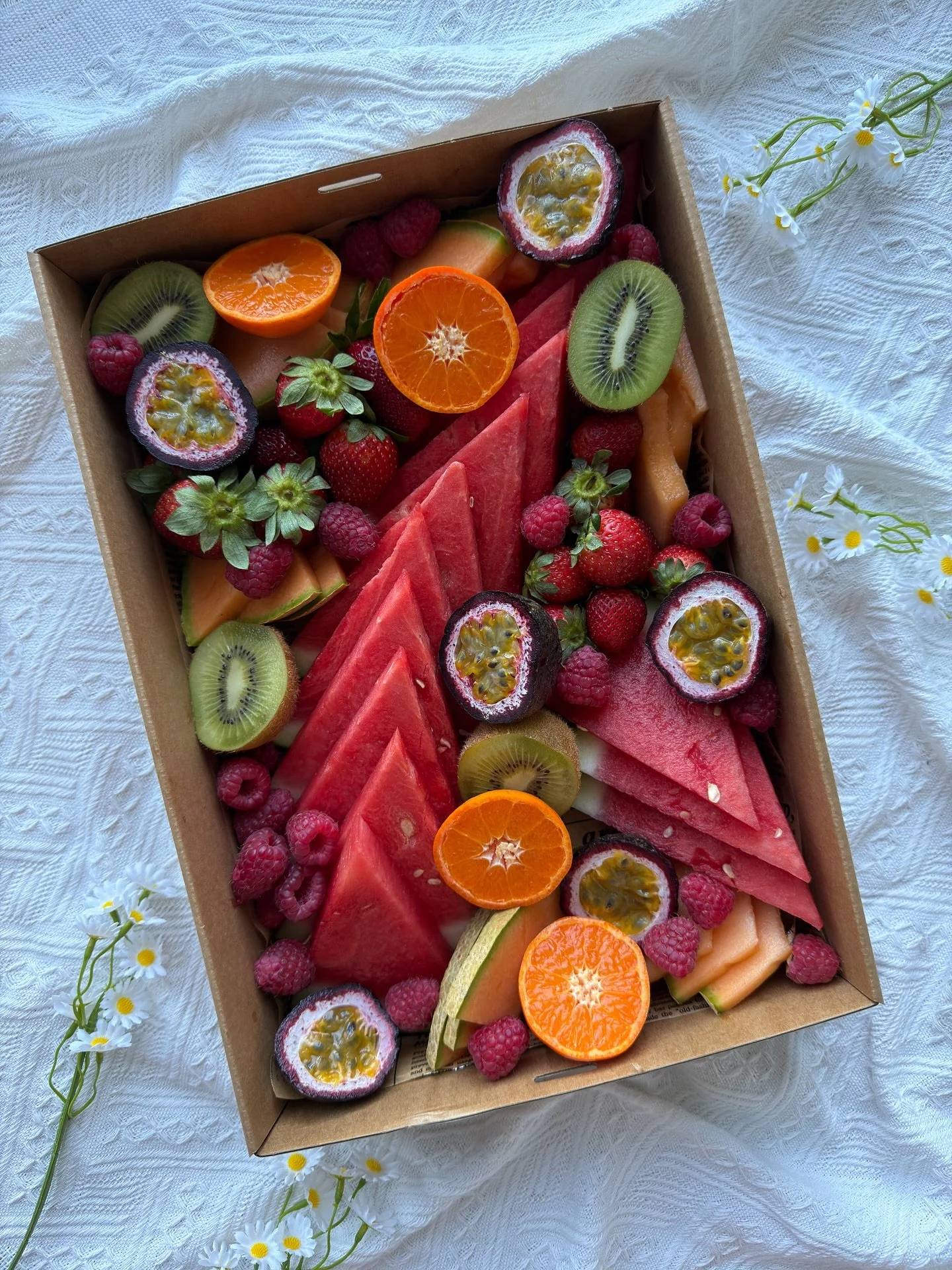 Summer loading…☀️ Order our seasonal fruit box to sweeten your next gathering ✨🍇 #curedcravings