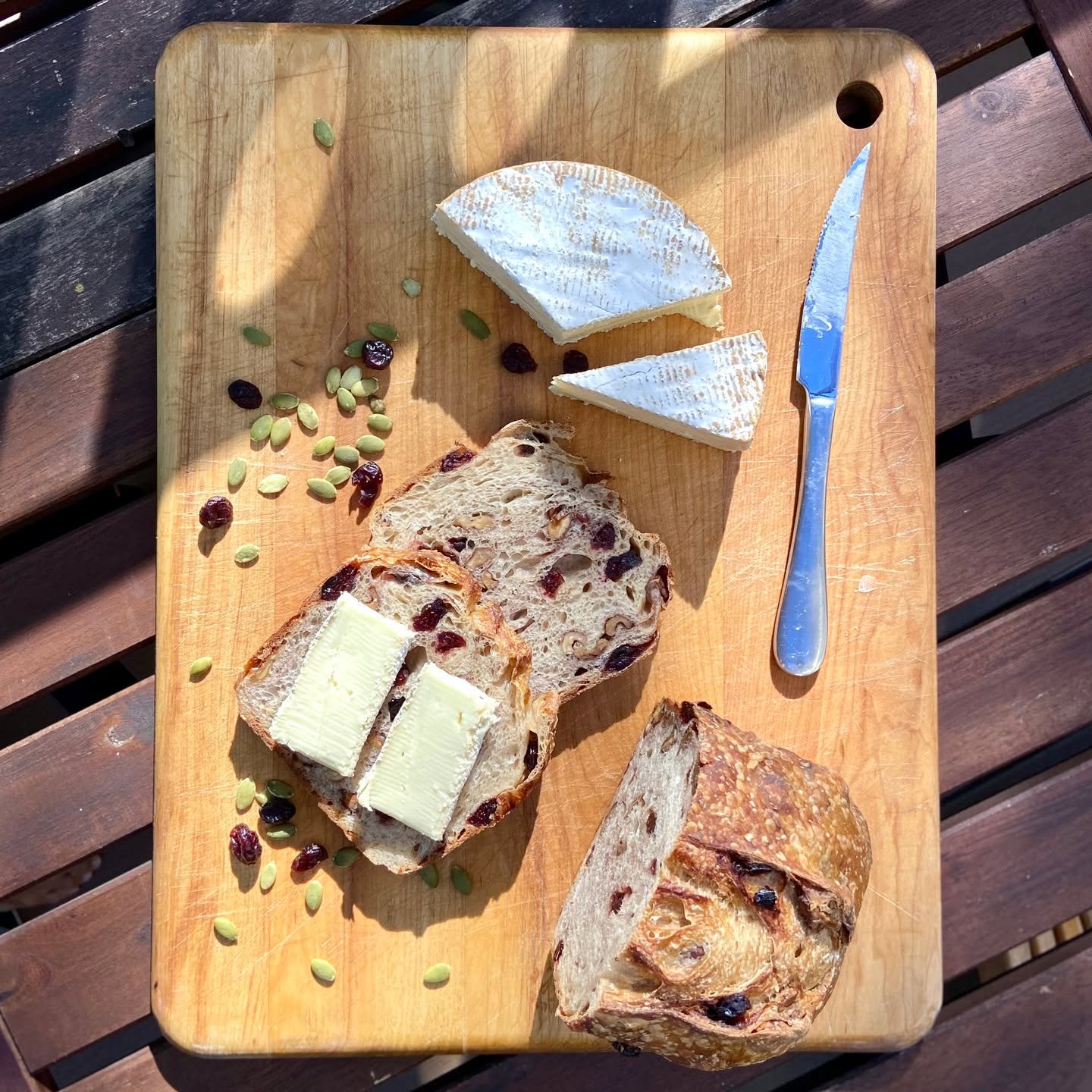 Cranberry walnut sourdough paired with creamy brie #sourdough #bread #microbakery #cheese #homebaker #brie