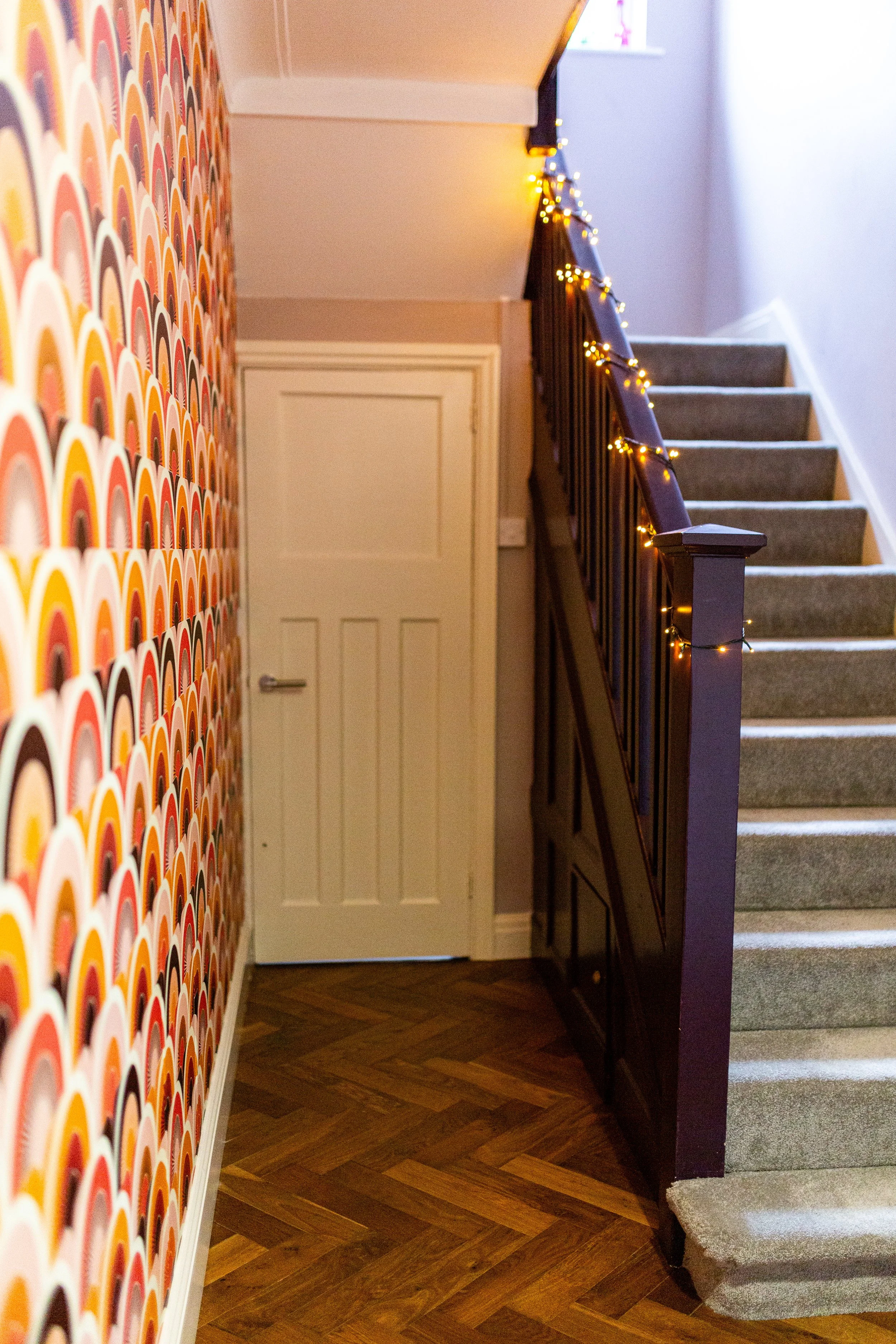 Statement hallway. Patterned wallpaper