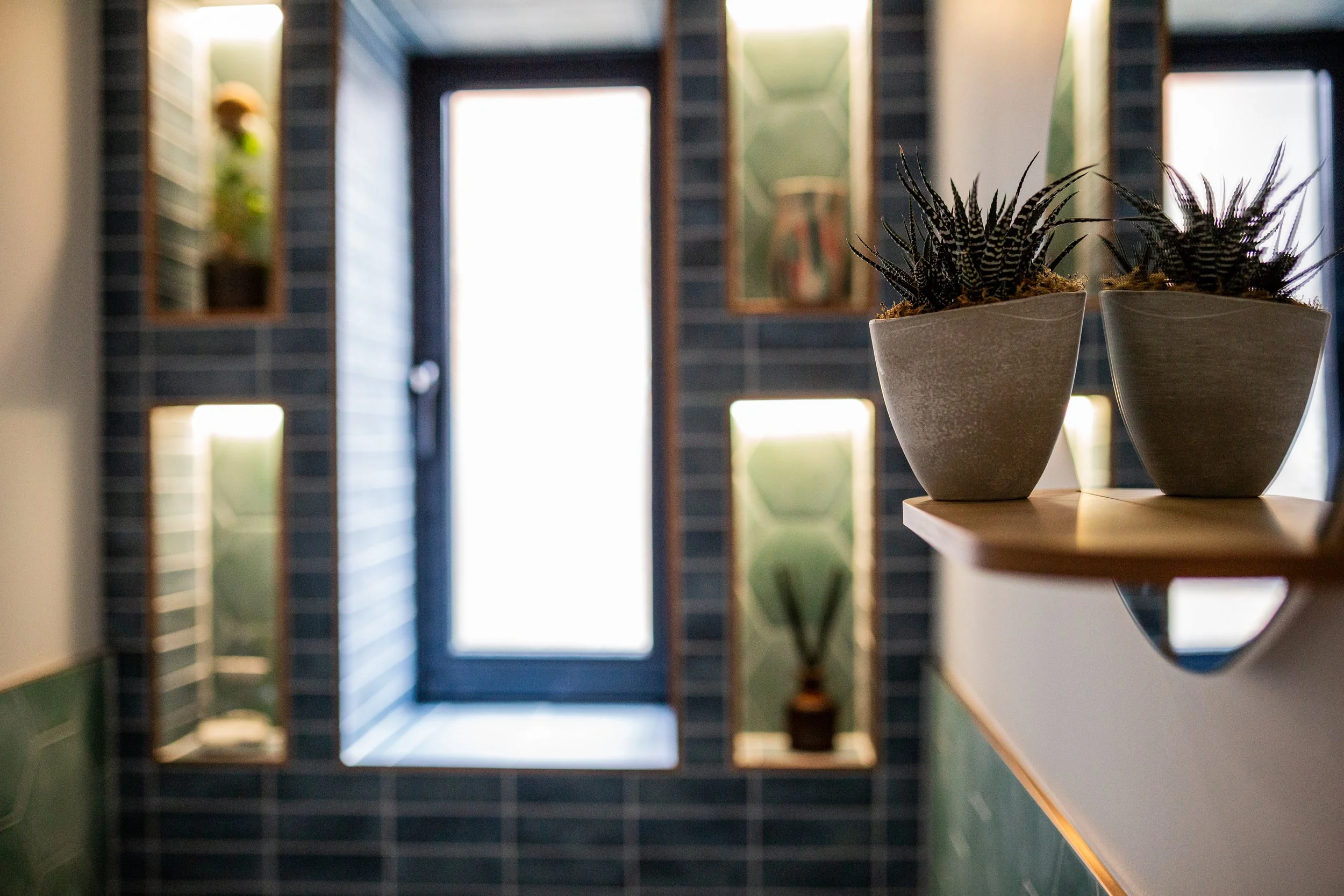 cloakroom design blue tiles green tiles