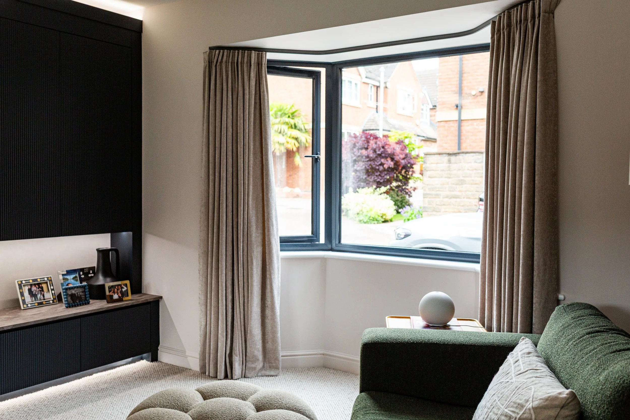 Bespoke living room interior design, Leeds, West Yorkshire, bespoke media wall, accent chair and footstool