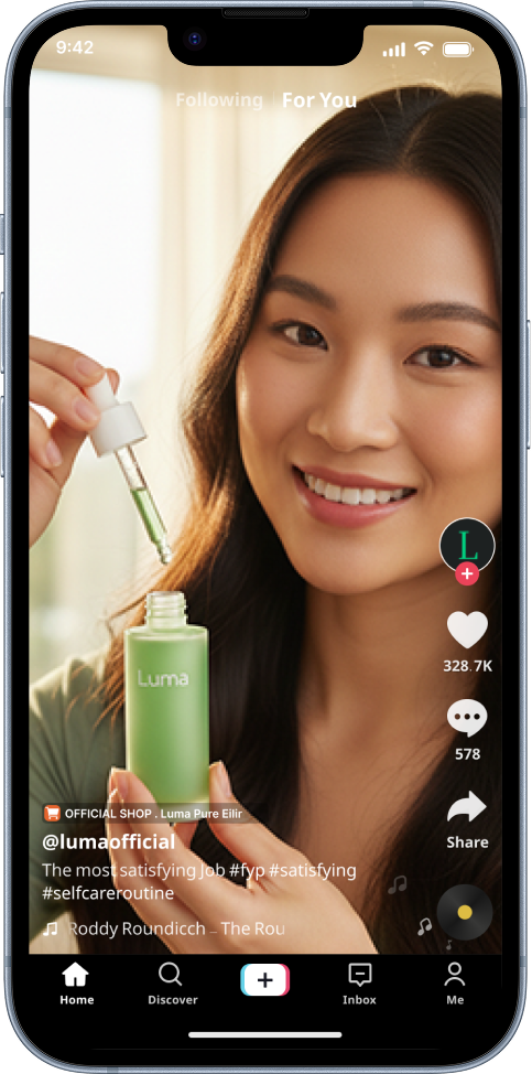 A woman with long dark hair holding a dropper and a green bottle labeled "Luma", demonstrating a skincare product in a TikTok video.