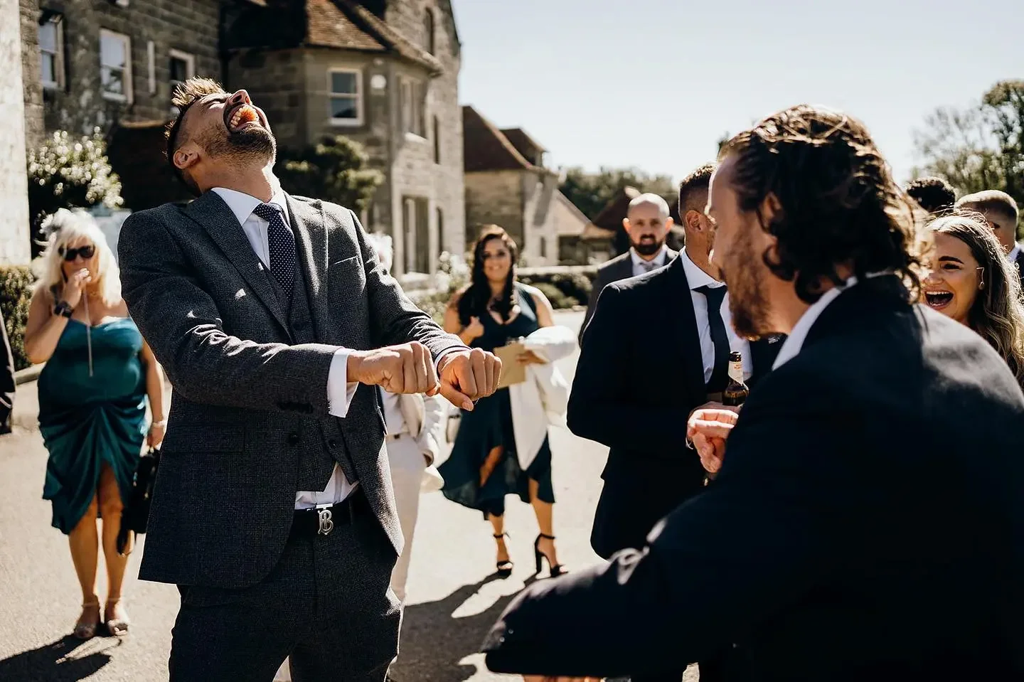 Brighton Wedding Magician and Host Just Saul making a guest laugh with his magical entertainment