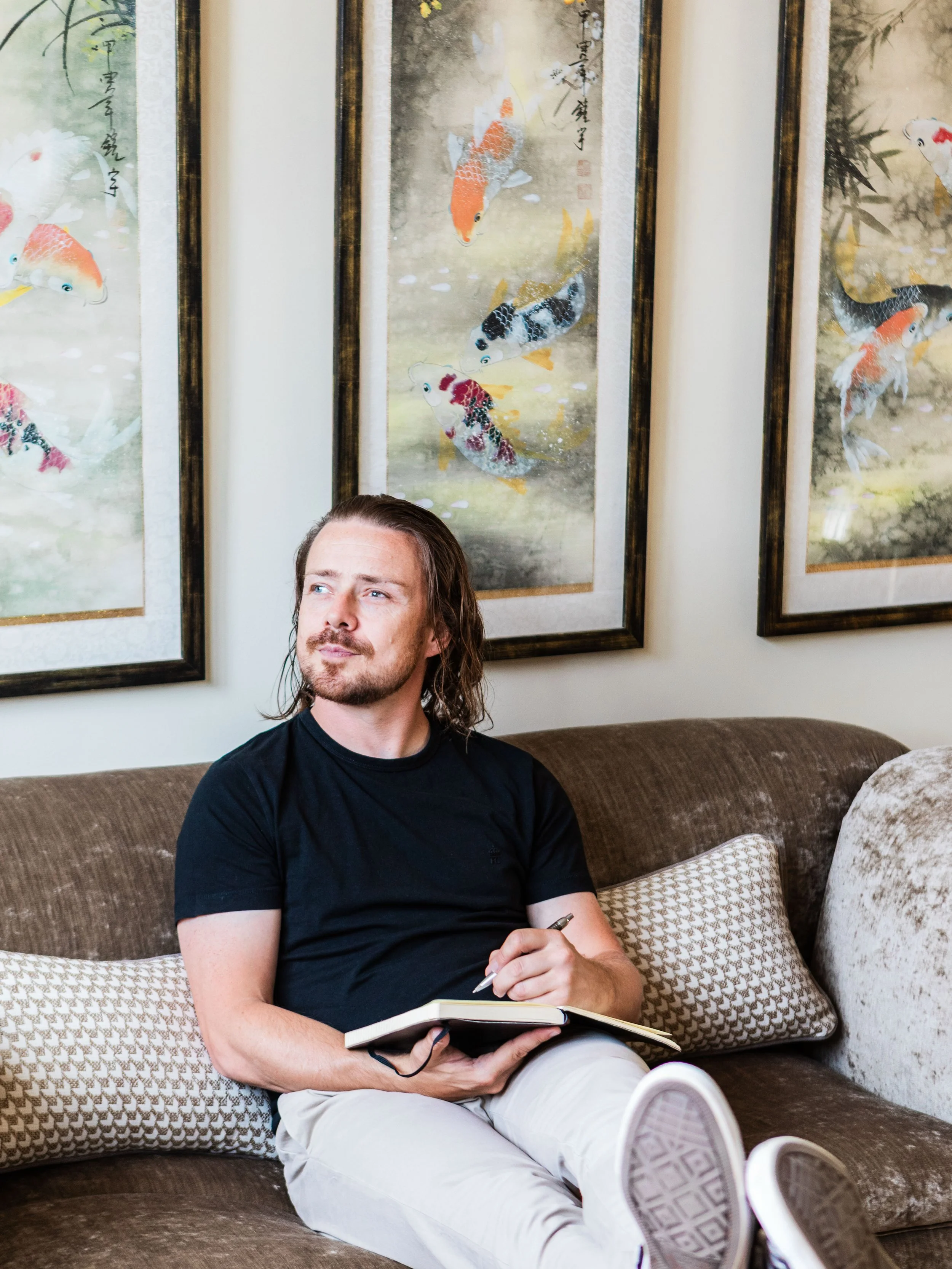 Just Saul relaxing on a sofa before a party booking