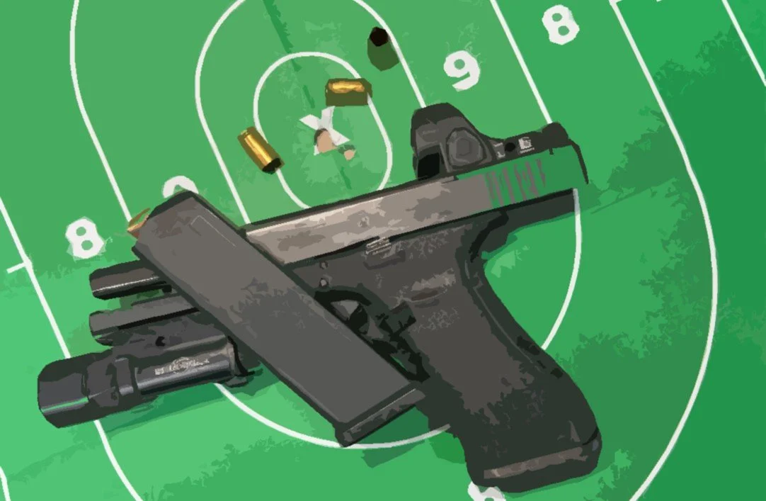 Handgun with magazine and ammunition lying on green bullseye target with a group fired in the x-ring and three expended cartridge casings.