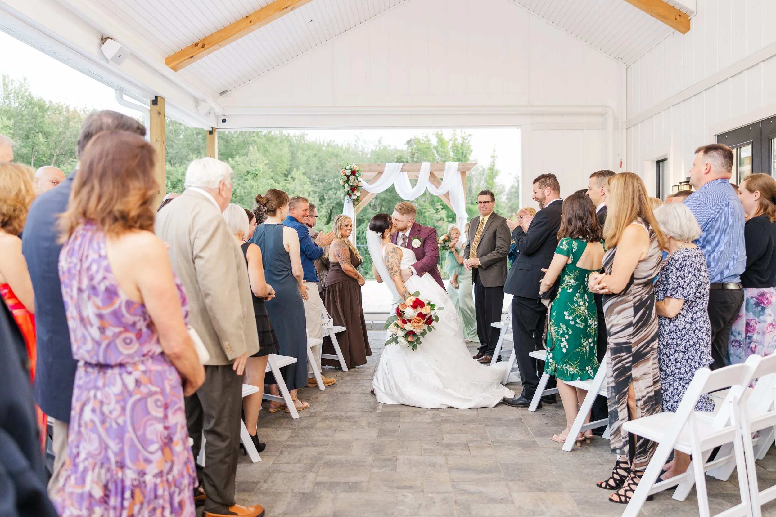 End of wedding ceremony located under the Covered Breezeway. 